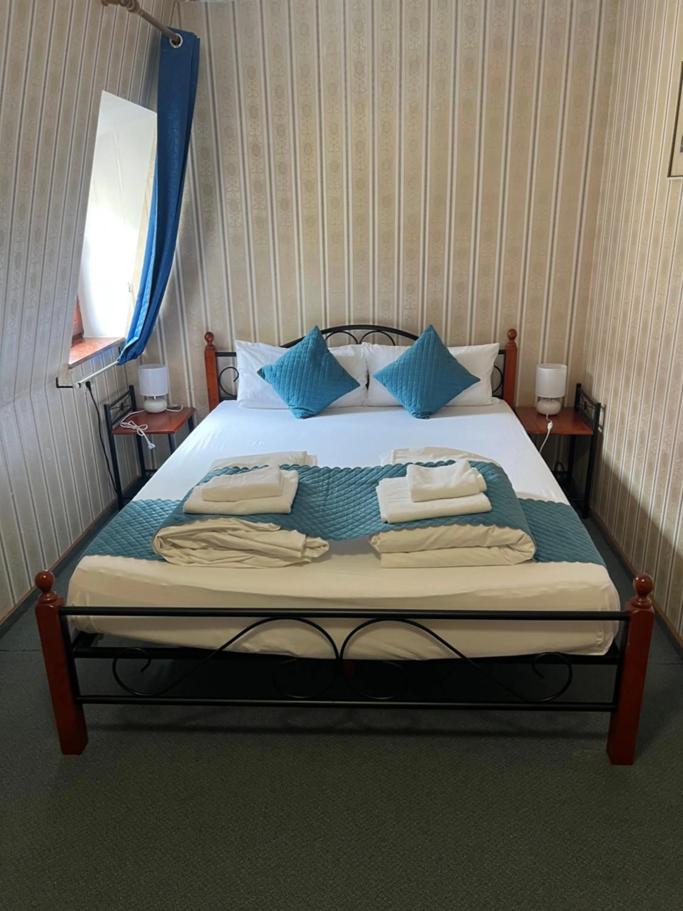 Bed in Hotel Schwarzer Adler