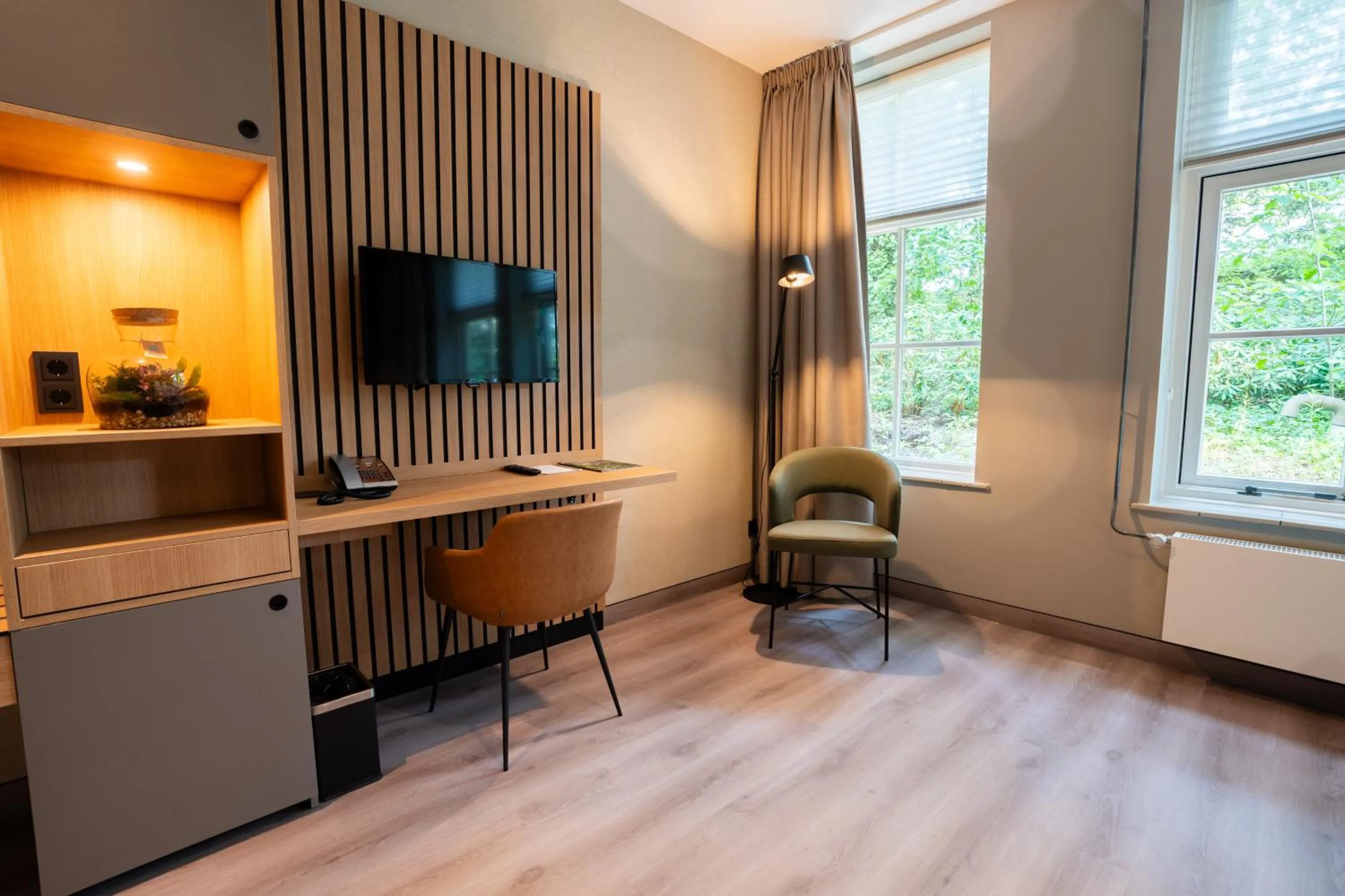 Bedroom in Hotel Kontakt der Kontinenten