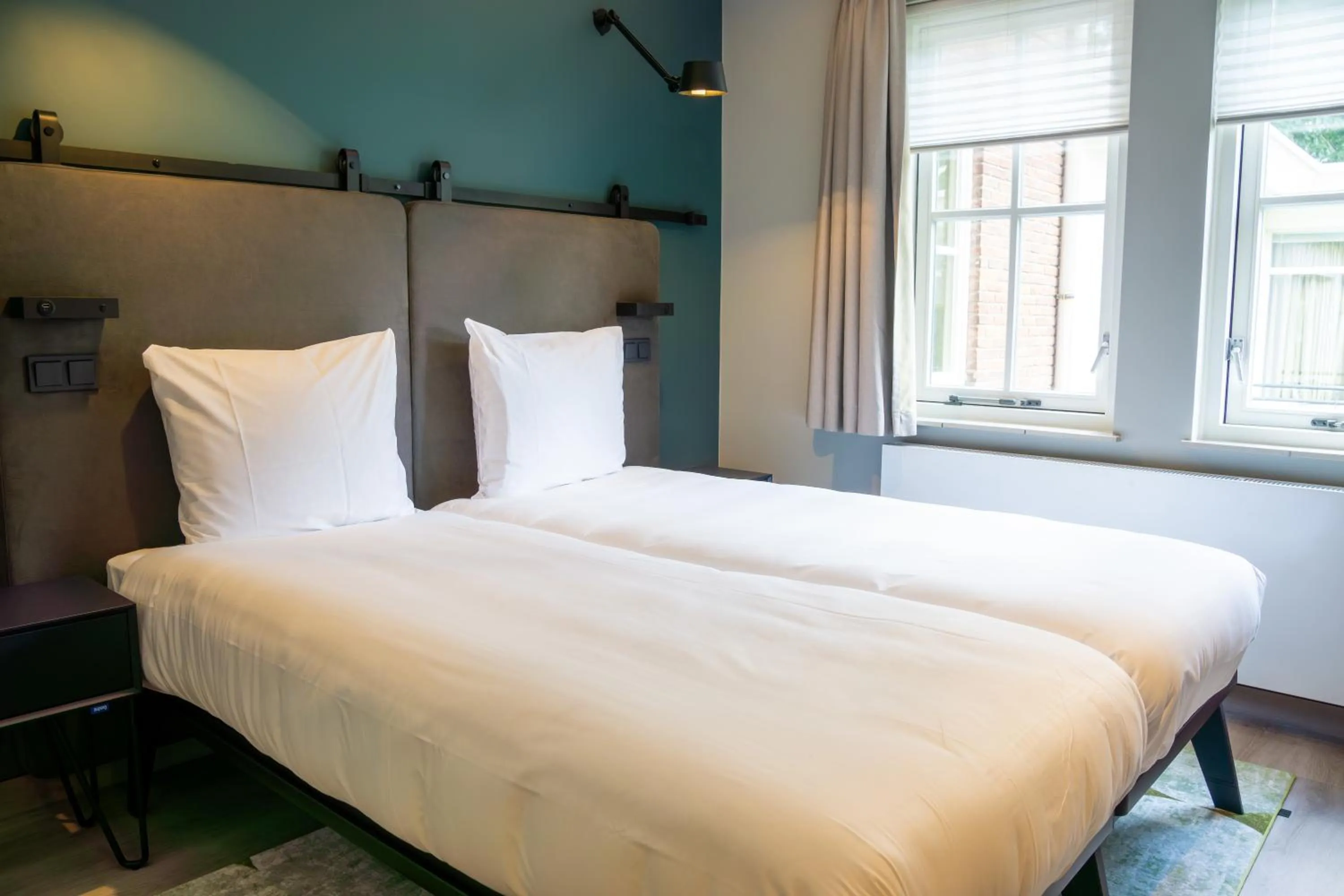 Bed in Hotel Kontakt der Kontinenten