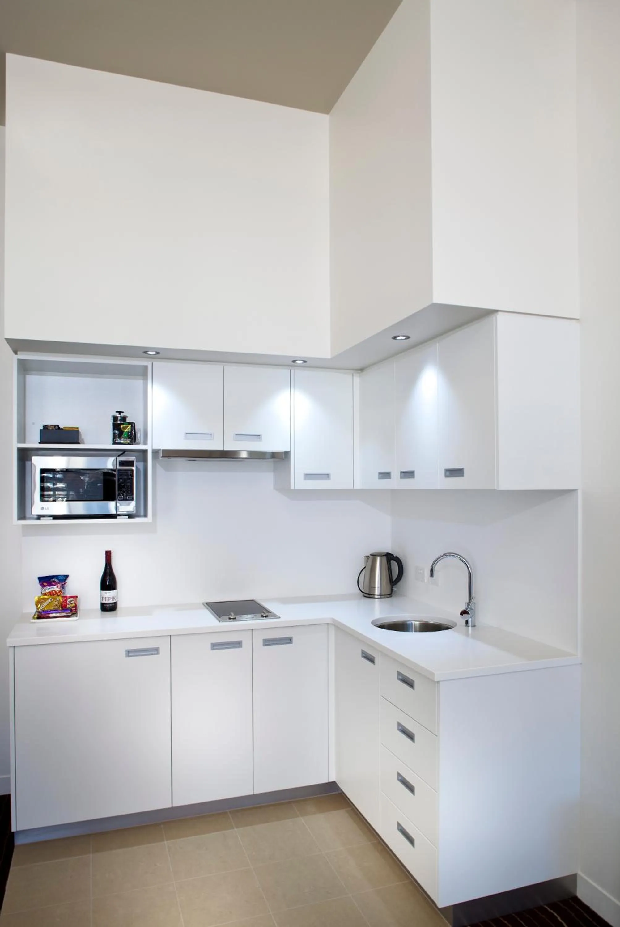 Kitchen or kitchenette in Mantra Charles Hotel