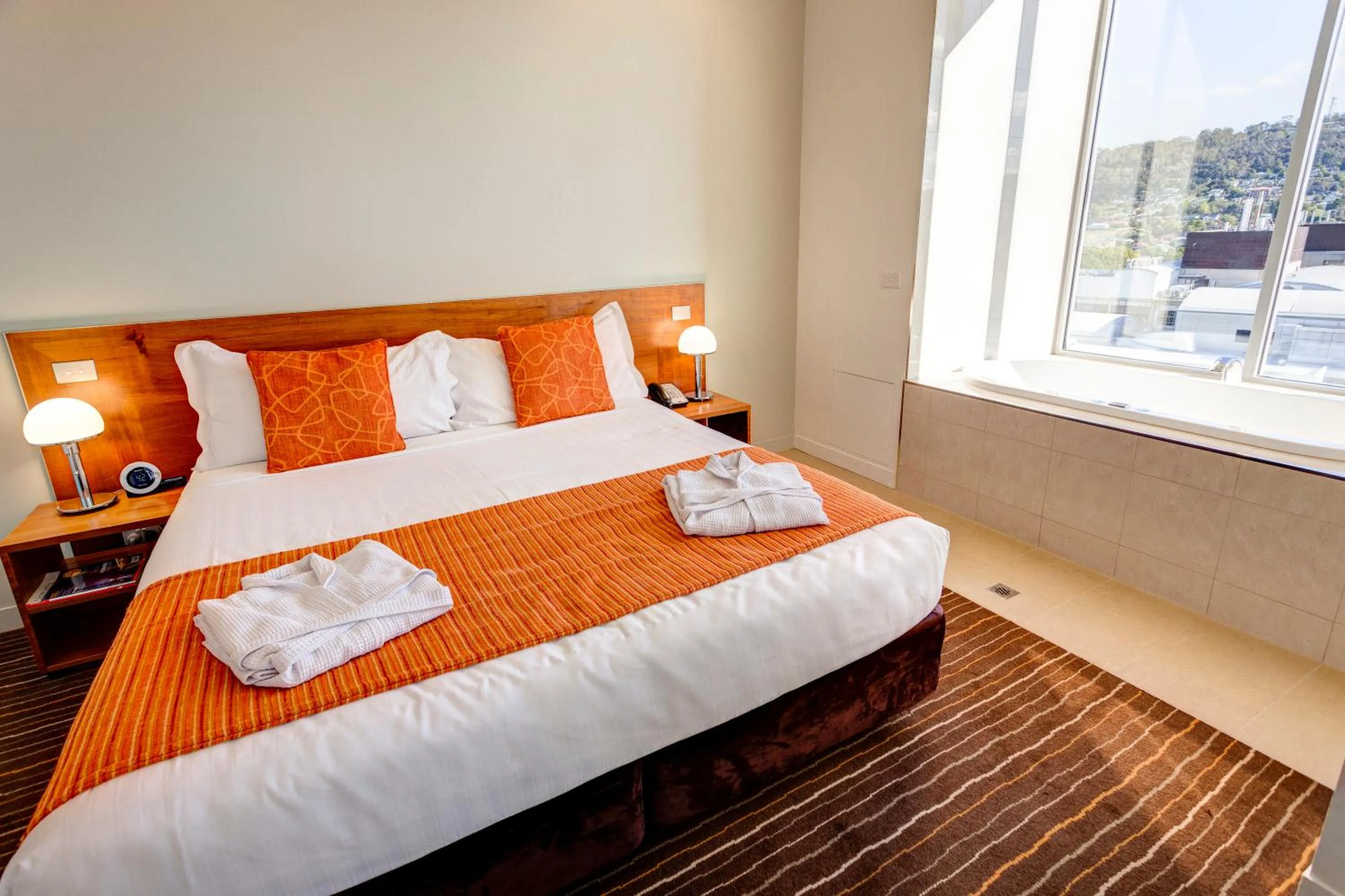 Bed in Mantra Charles Hotel