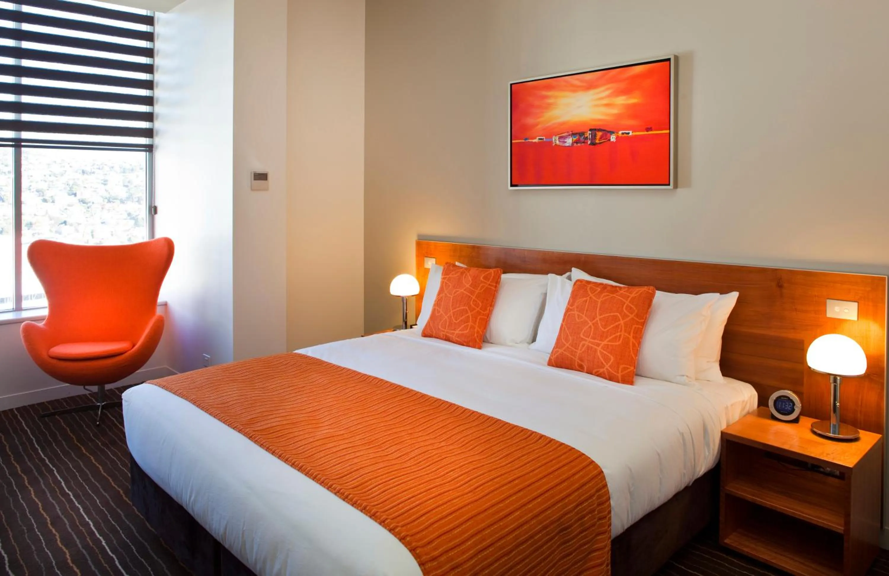 Bed in Mantra Charles Hotel