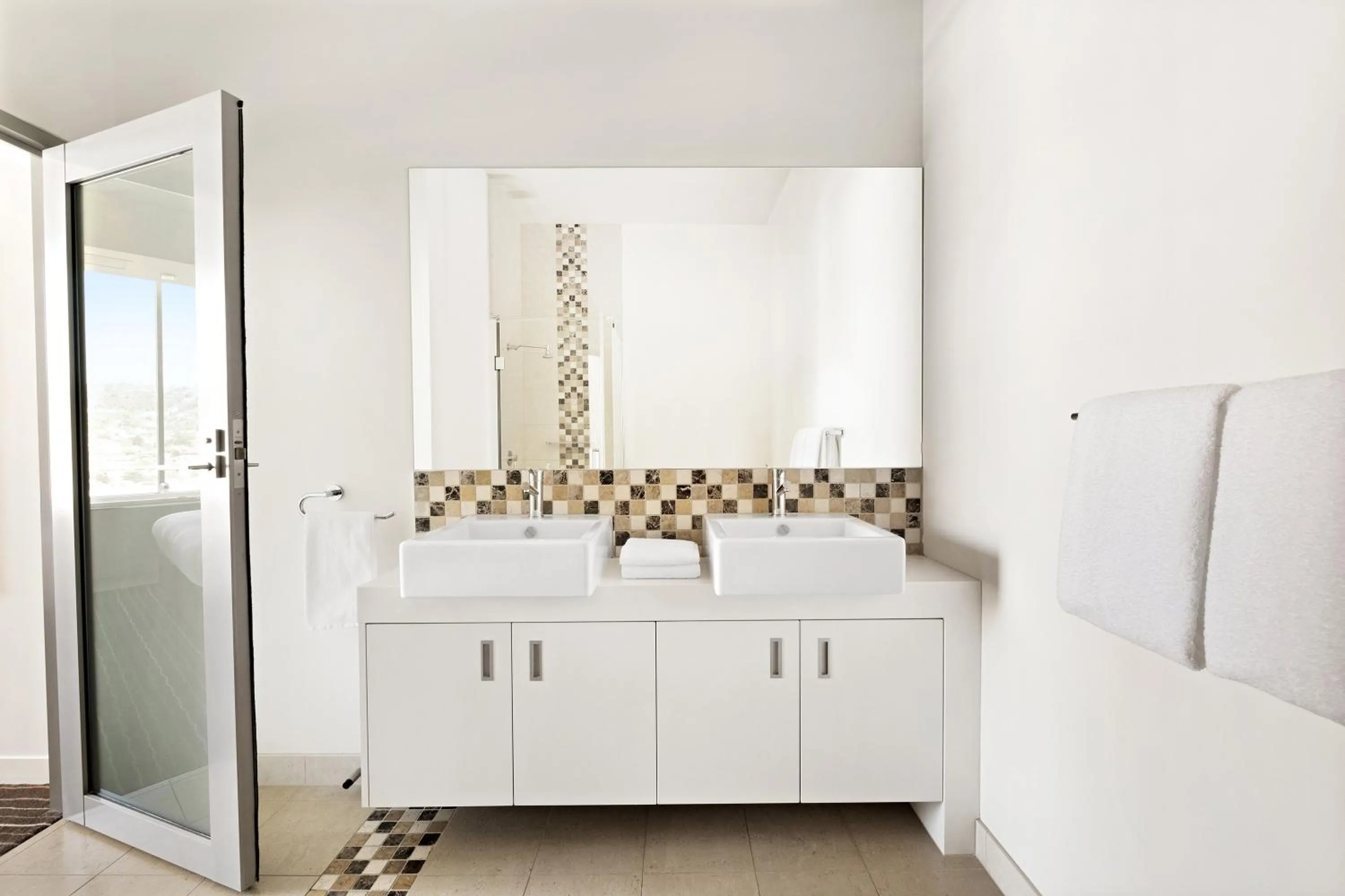 Bathroom in Mantra Charles Hotel