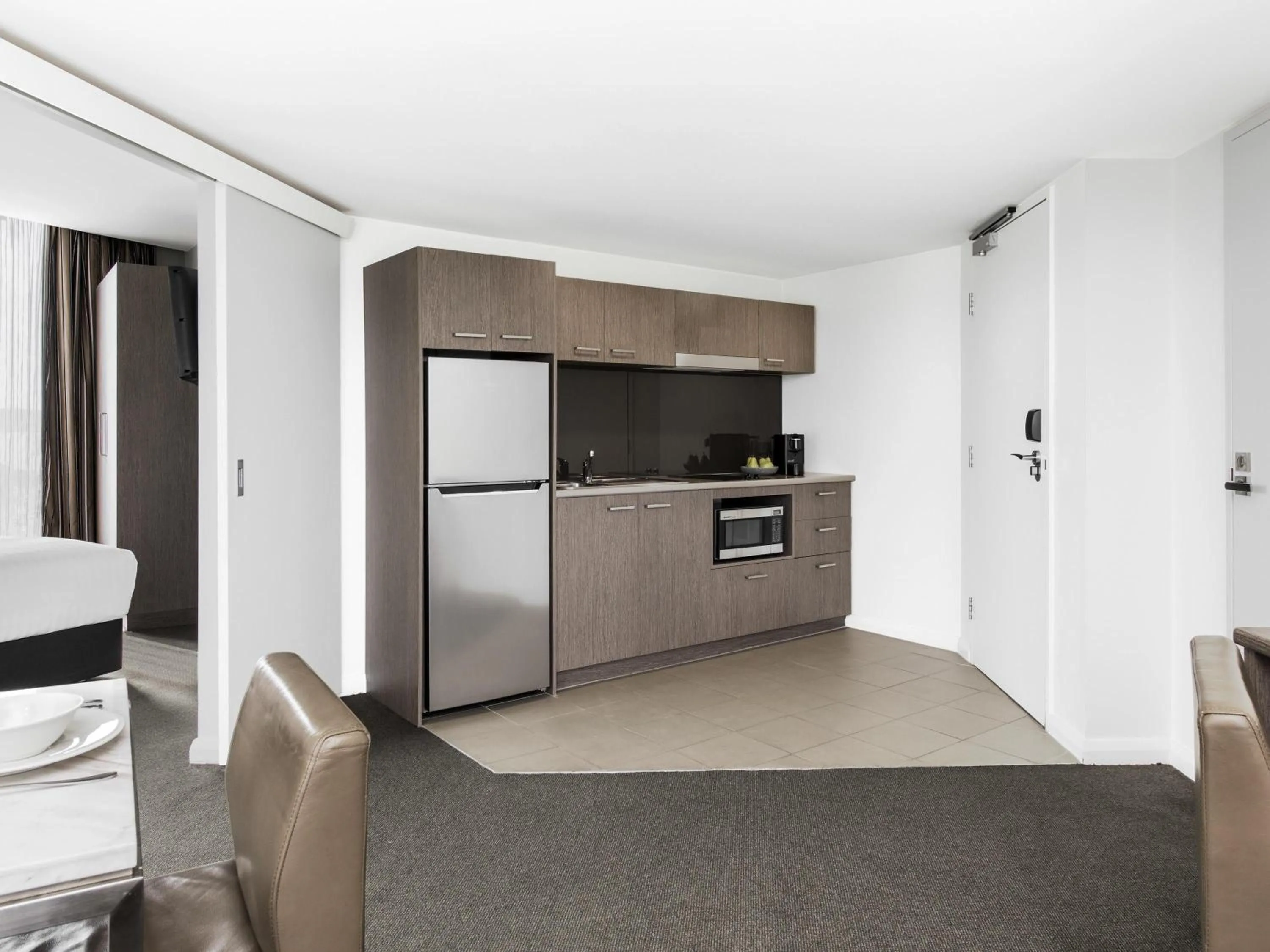 Bedroom in Mantra Collins Hotel