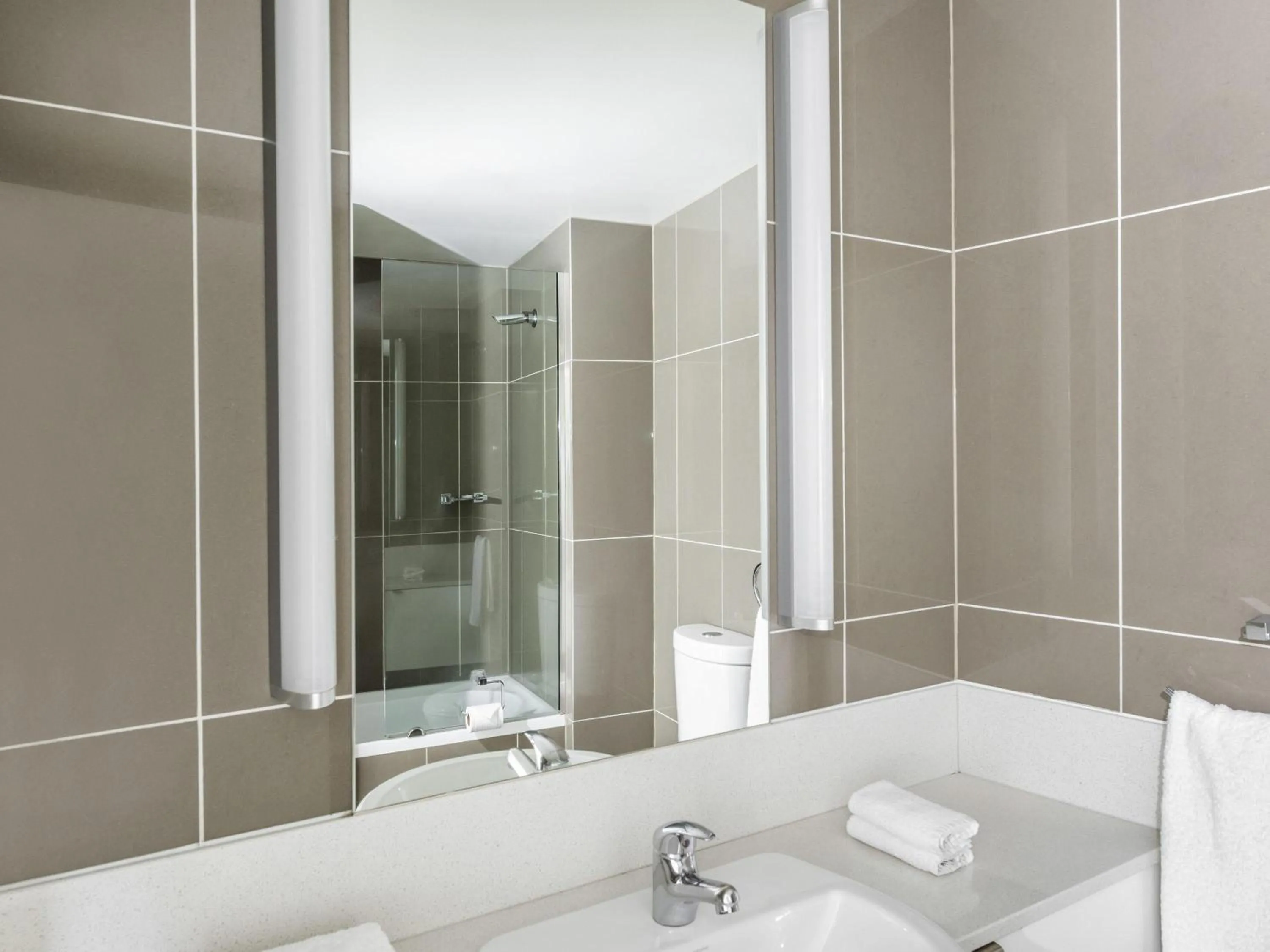 Bedroom in Mantra Collins Hotel