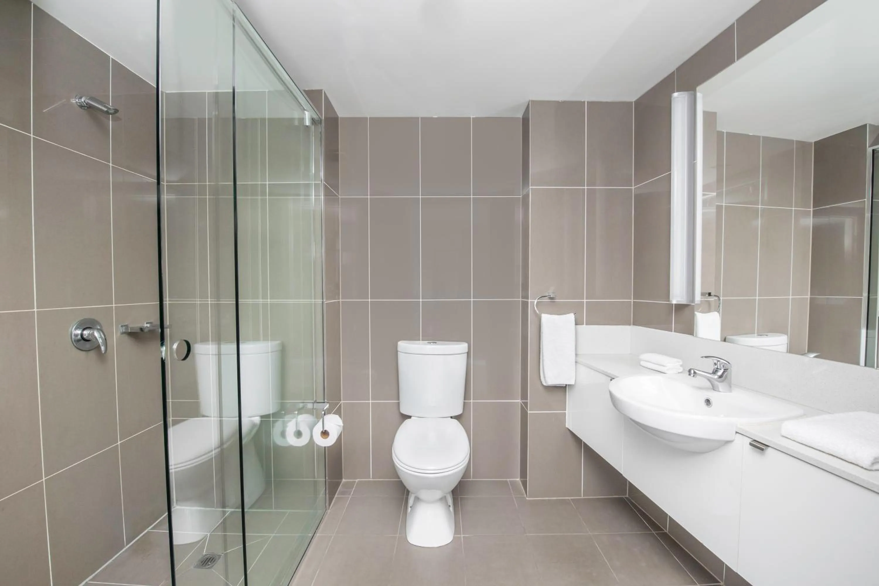 Bathroom in Mantra Collins Hotel