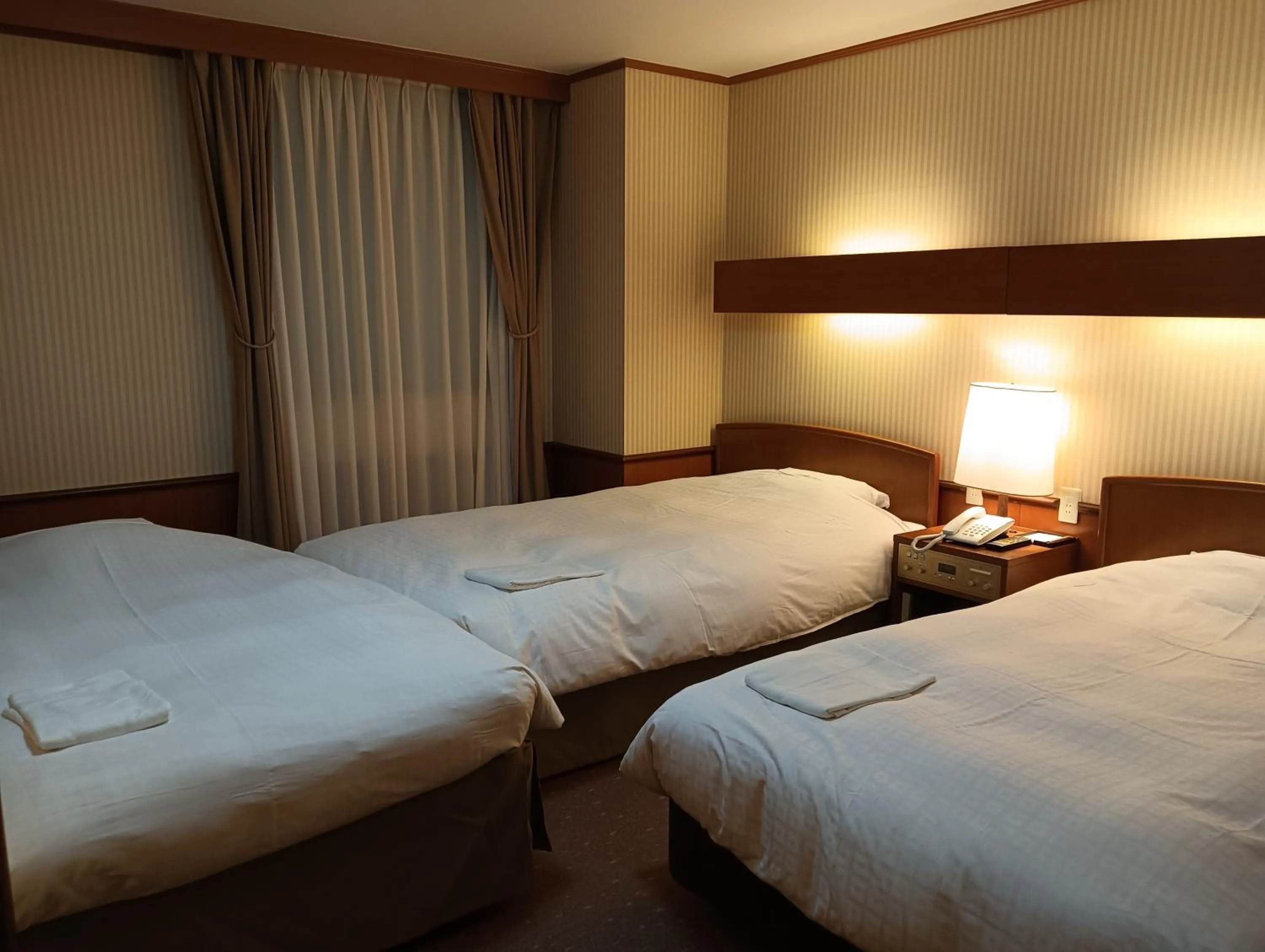 Bed in Daiichi Inn Park