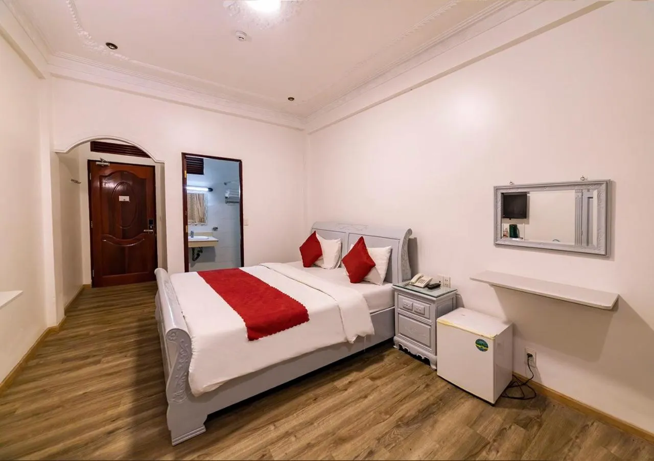 Bed in Dragon King 1 Hotel