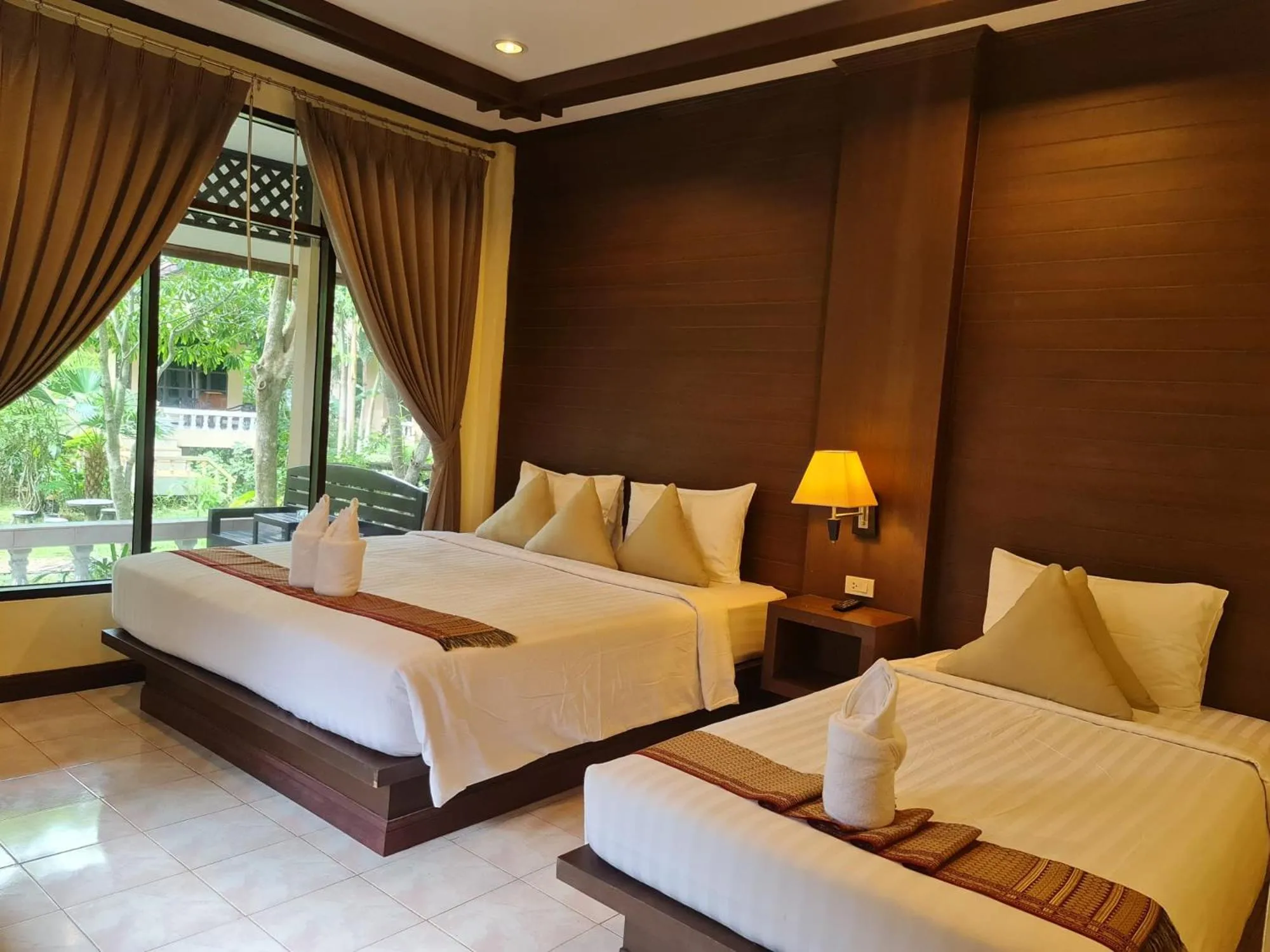 Bed in Clean Beach Resort