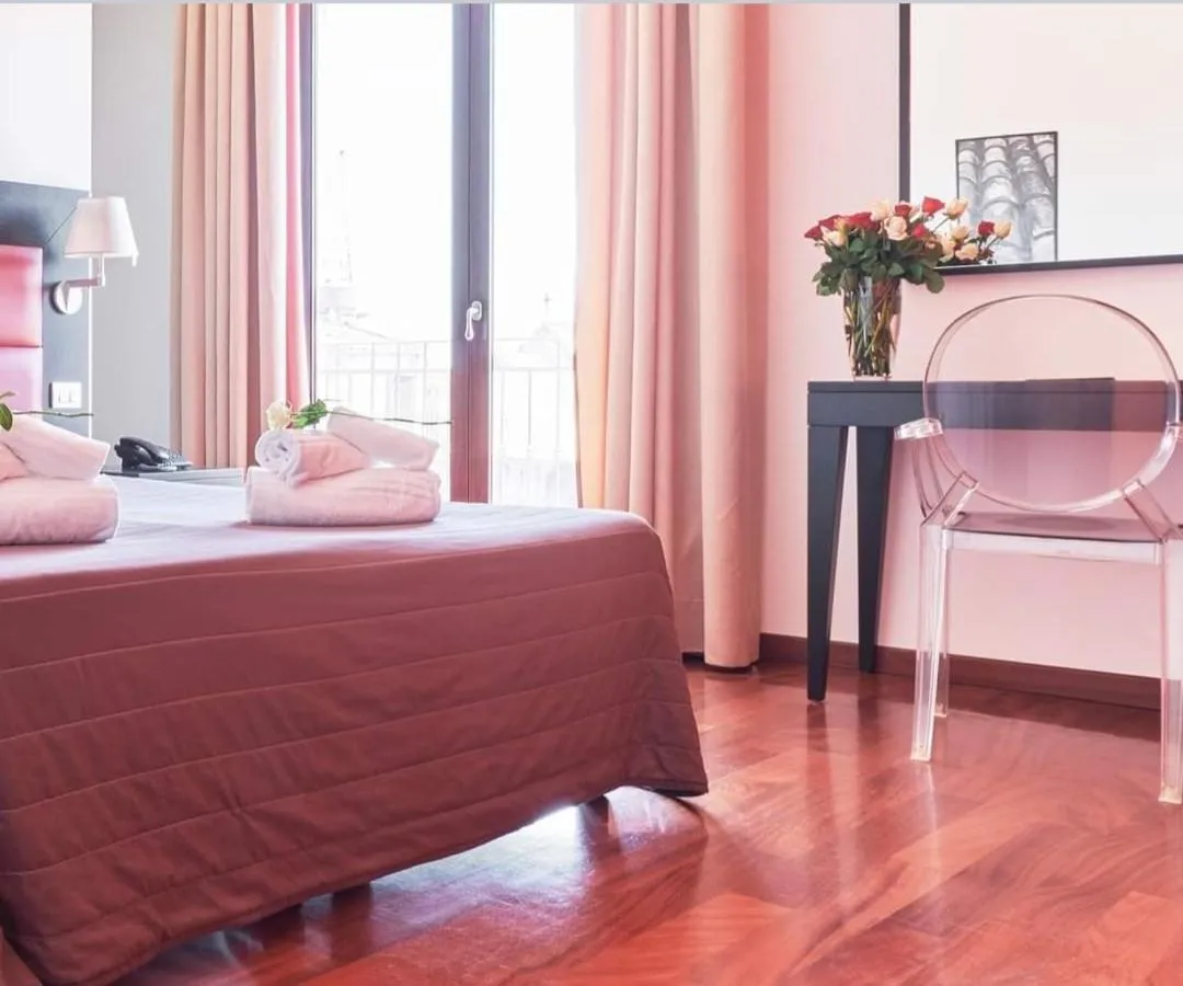 Bed in La Chicca Palace Hotel