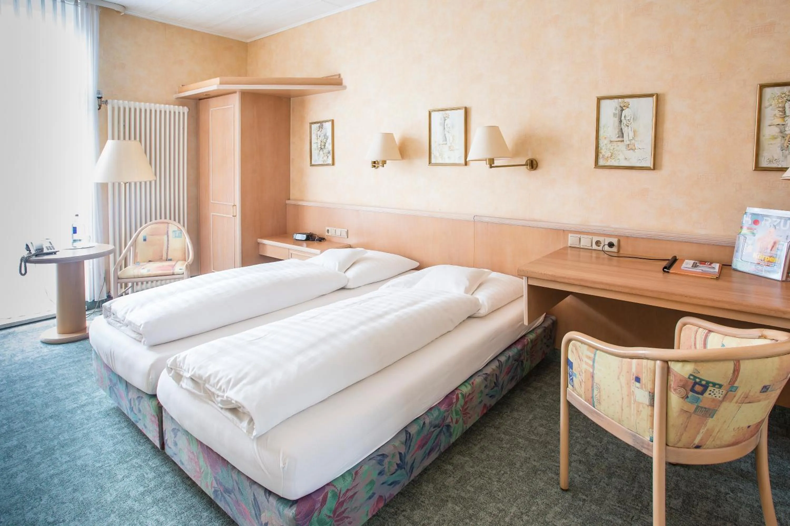 Photo of the whole room, Bed in Nordseehotel Freese