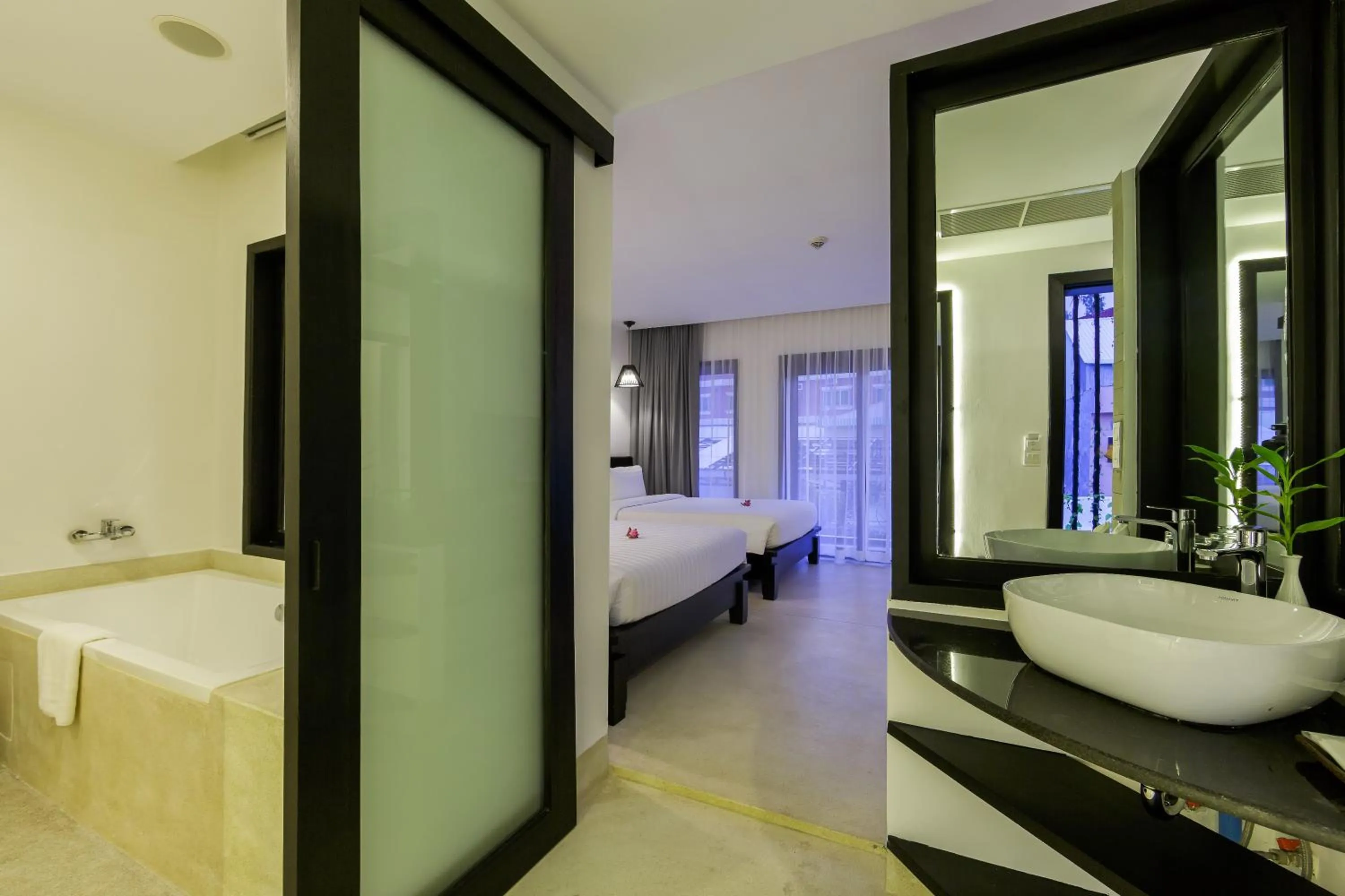 Photo of the whole room, Bed in Aroma Angkor Boutique Hotel