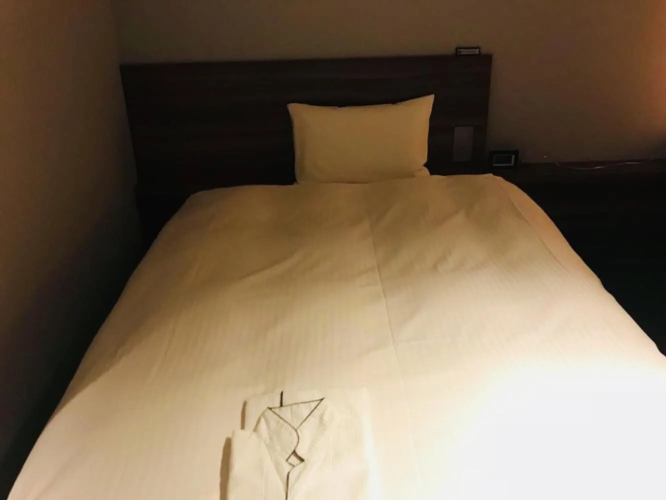 Bed in BRENZA HOTEL
