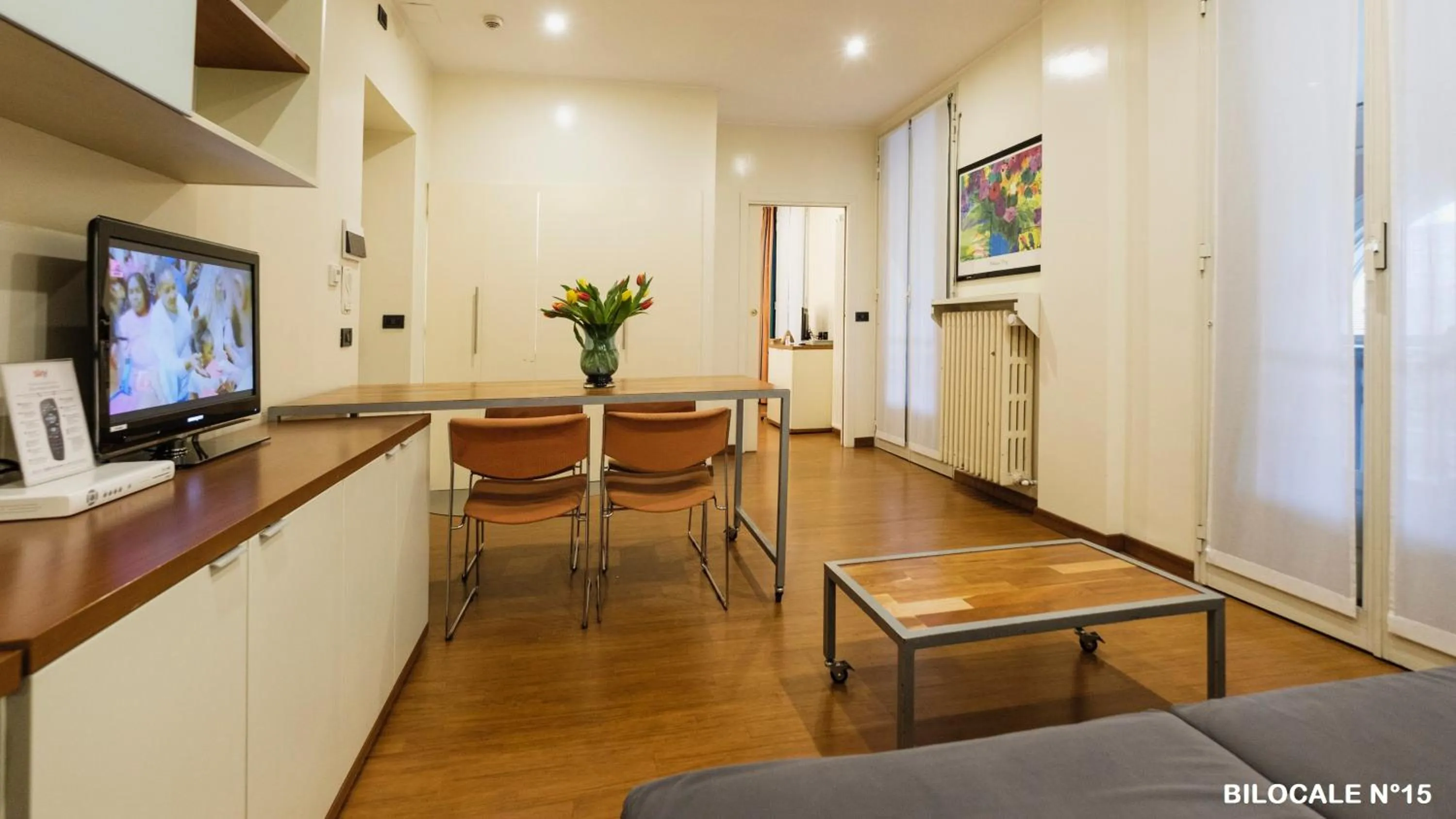 Communal lounge/ TV room in Residence Sacchi Aparthotel