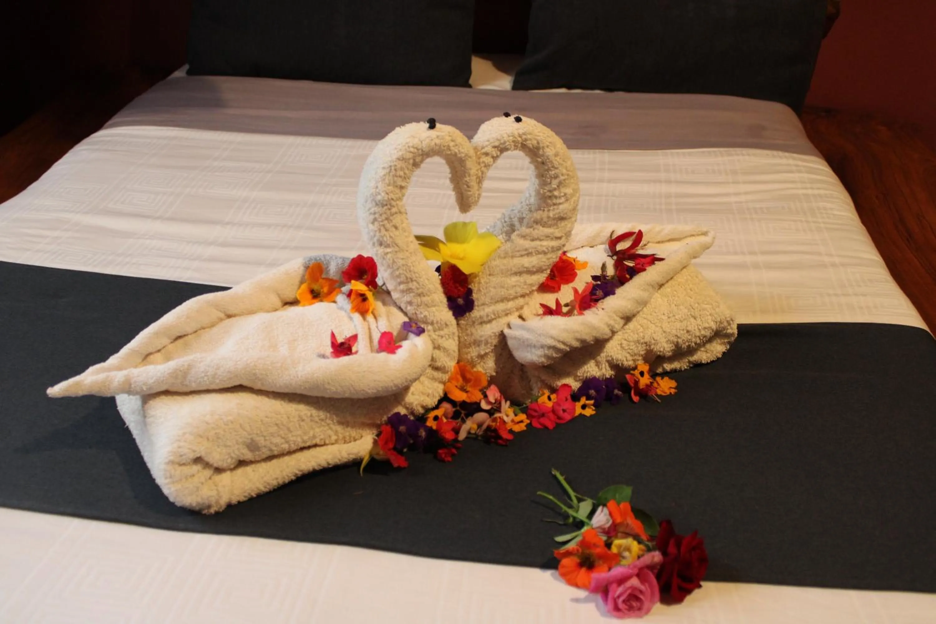 towels, Bed in SOUIMANGA-HOTEL