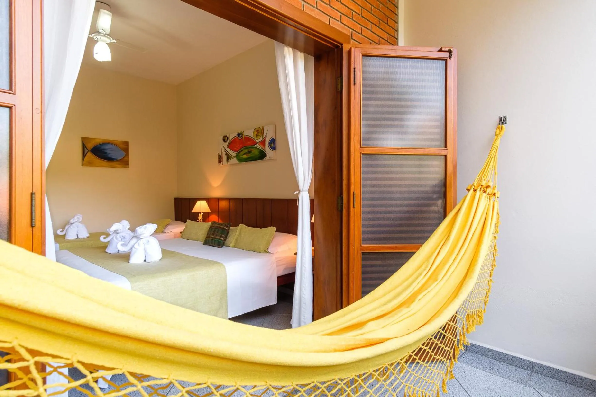 Bed in Pousada Vivamar