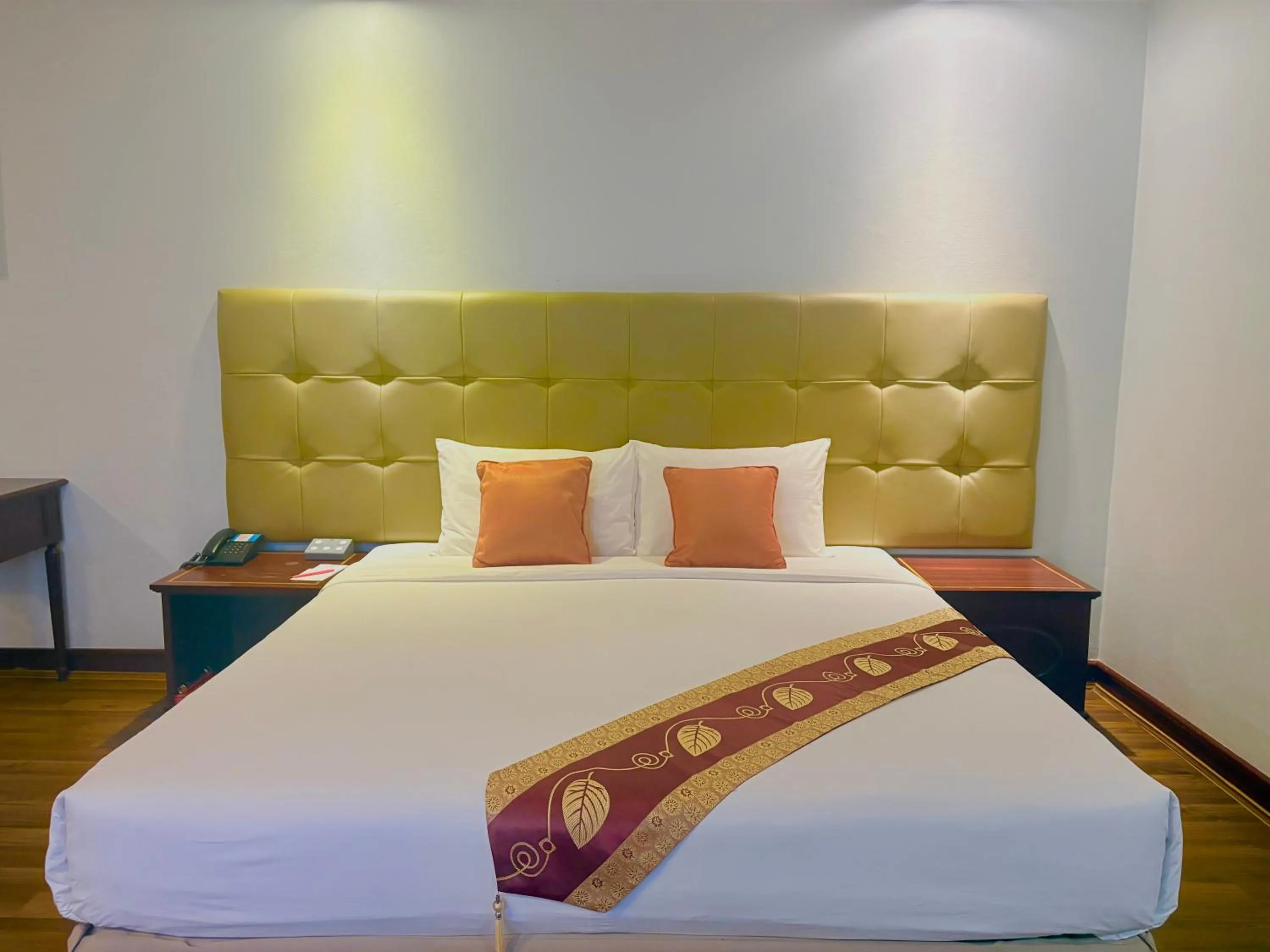 Bed in Tai Pan Hotel