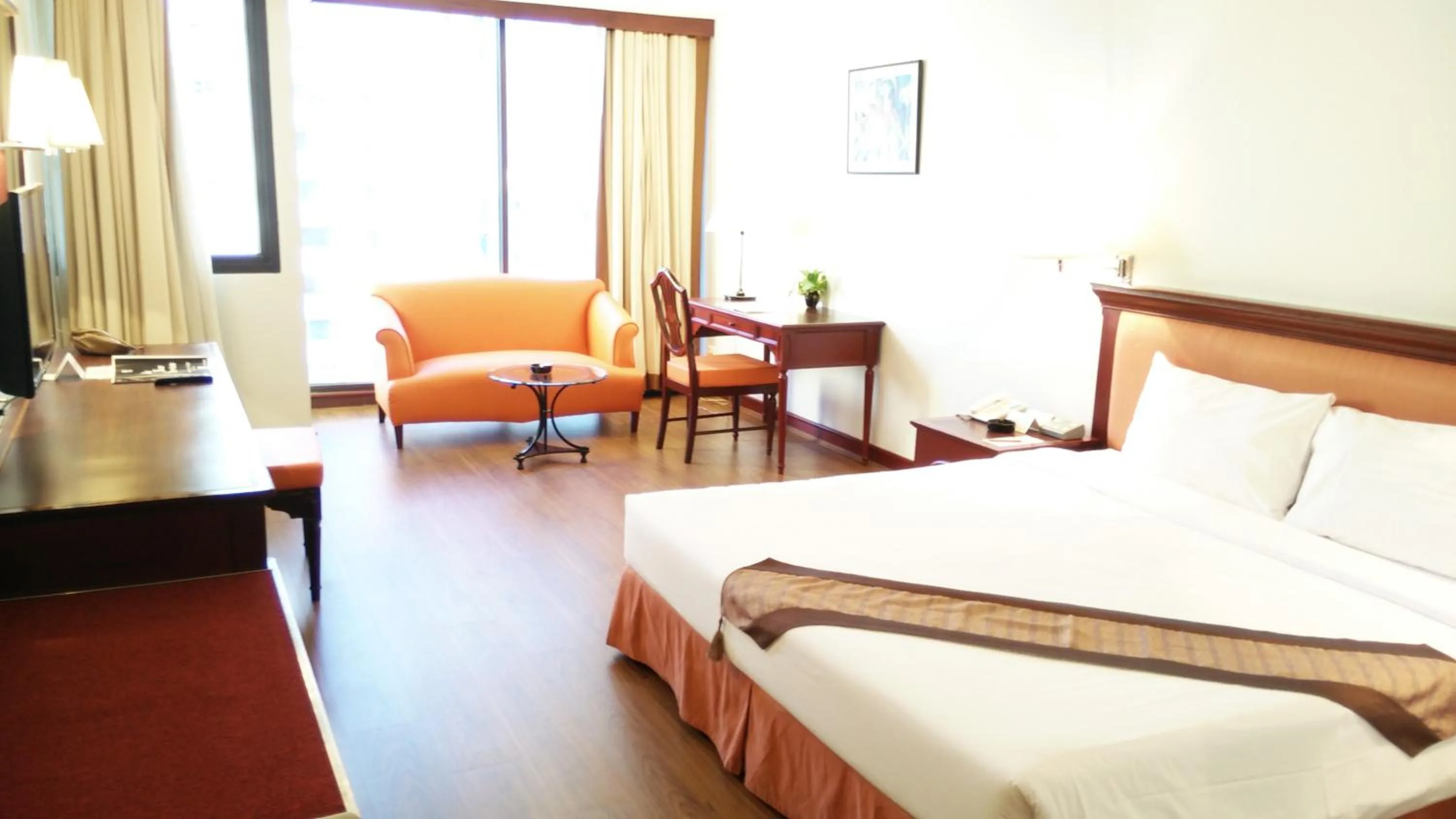 Bed in Tai Pan Hotel