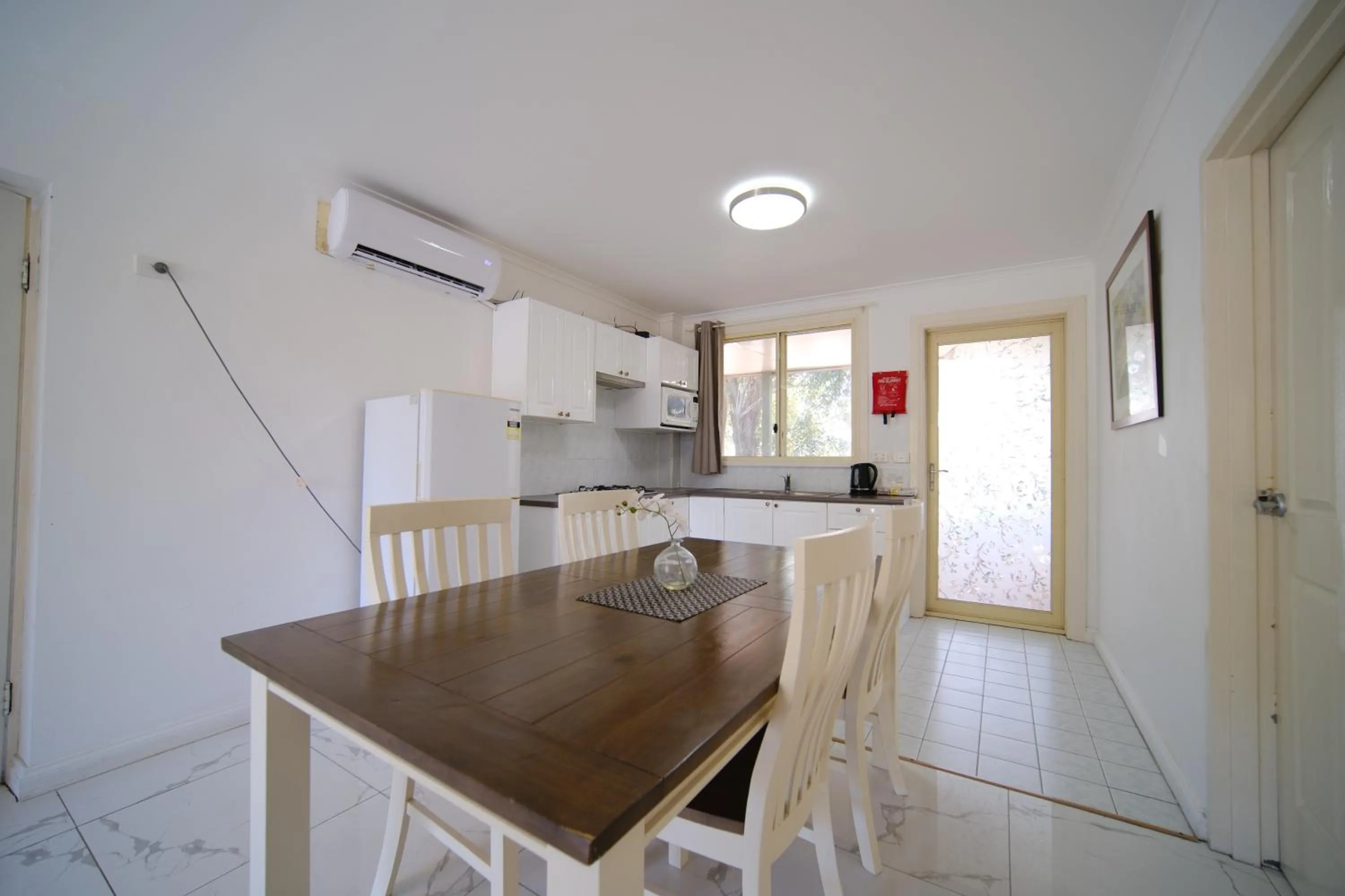 Kitchen or kitchenette in Golf Place Inn Wollongong