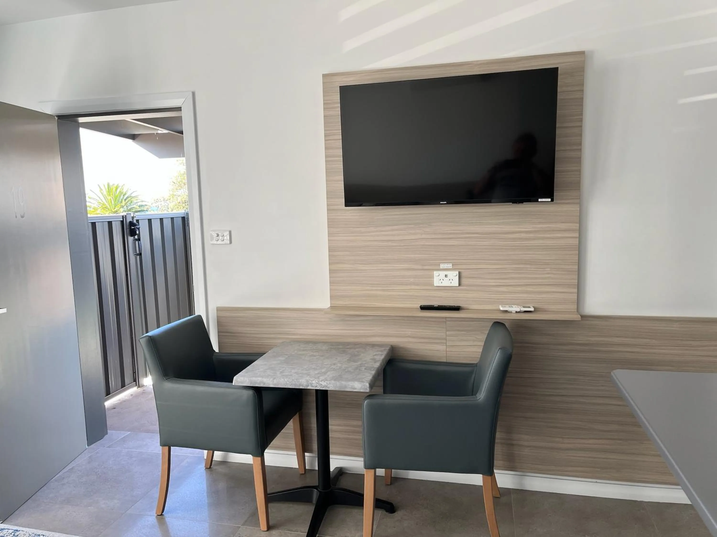 Communal lounge/ TV room in Jervis Bay Motel