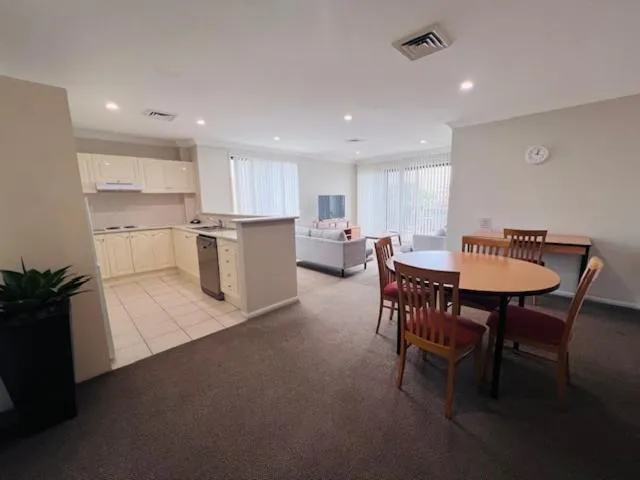 Kitchen or kitchenette in Wollongong Serviced Apartments