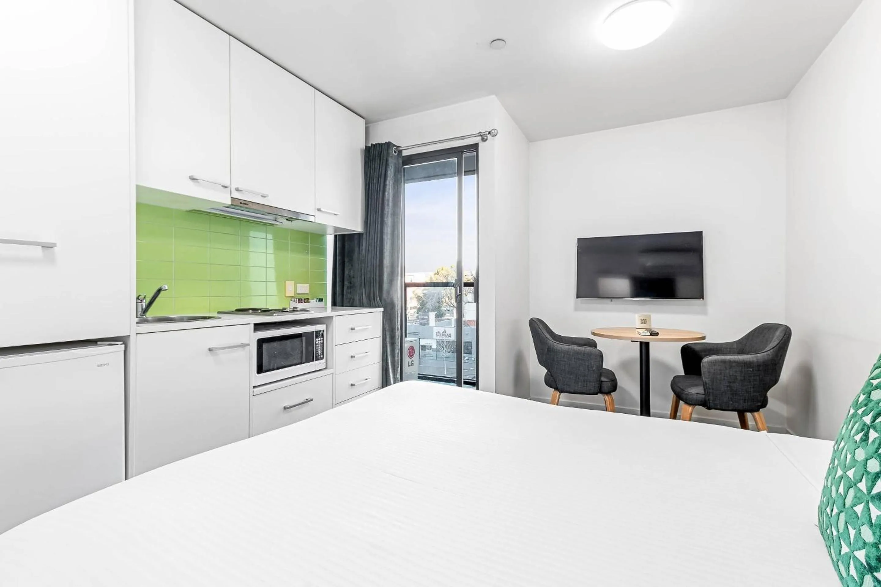 Bedroom in Quality Apartments North Melbourne