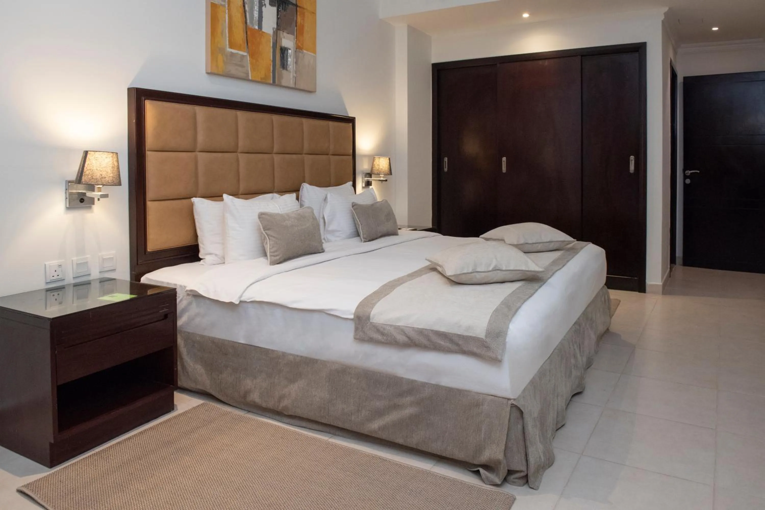 Bed in Corp Executive Hotel Doha Suites