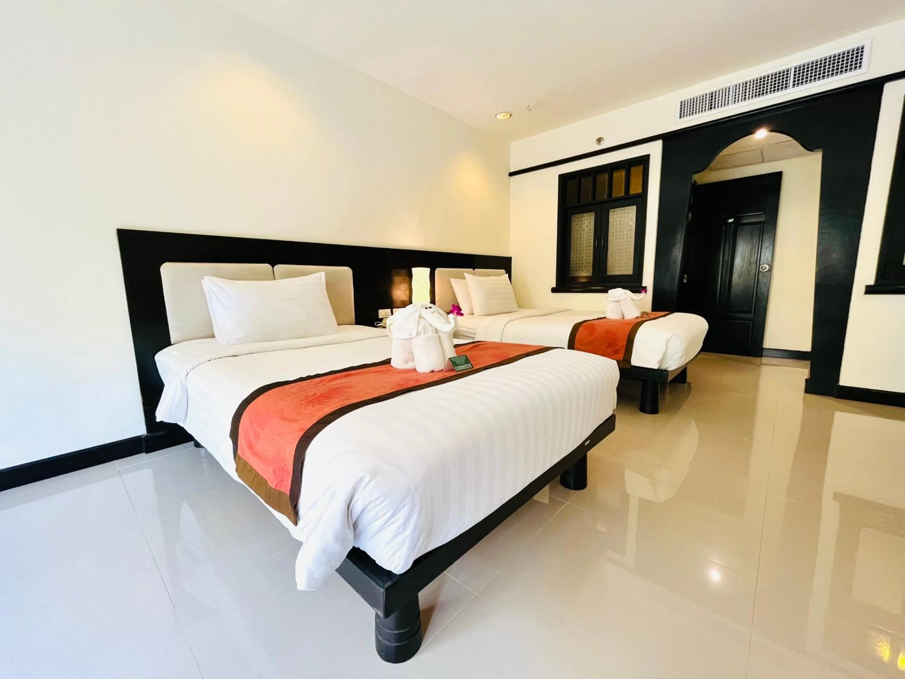 Bed in Woraburi Phuket Resort & Spa - SHA Plus