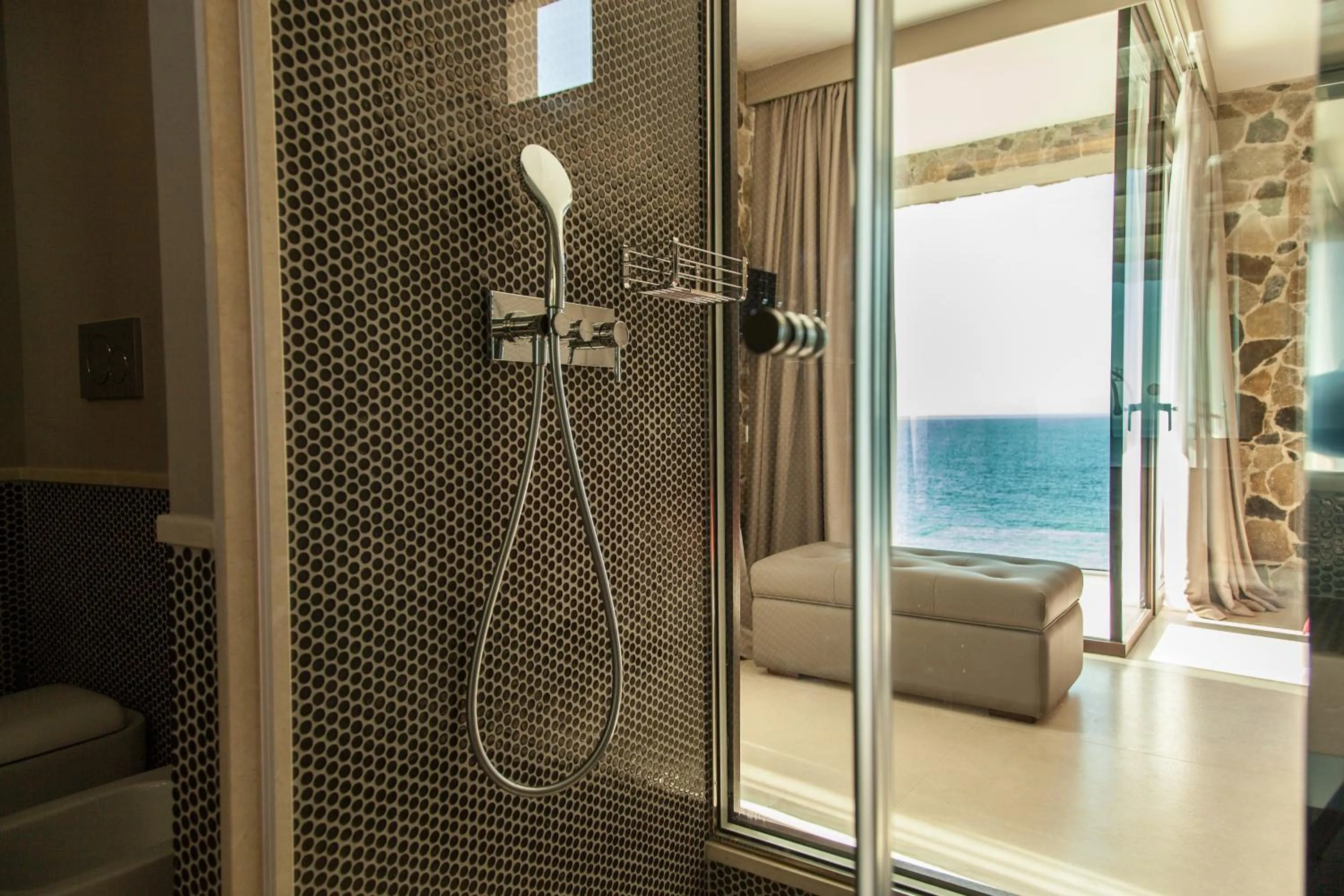 Shower in Ngonia Bay Boutique Hotel