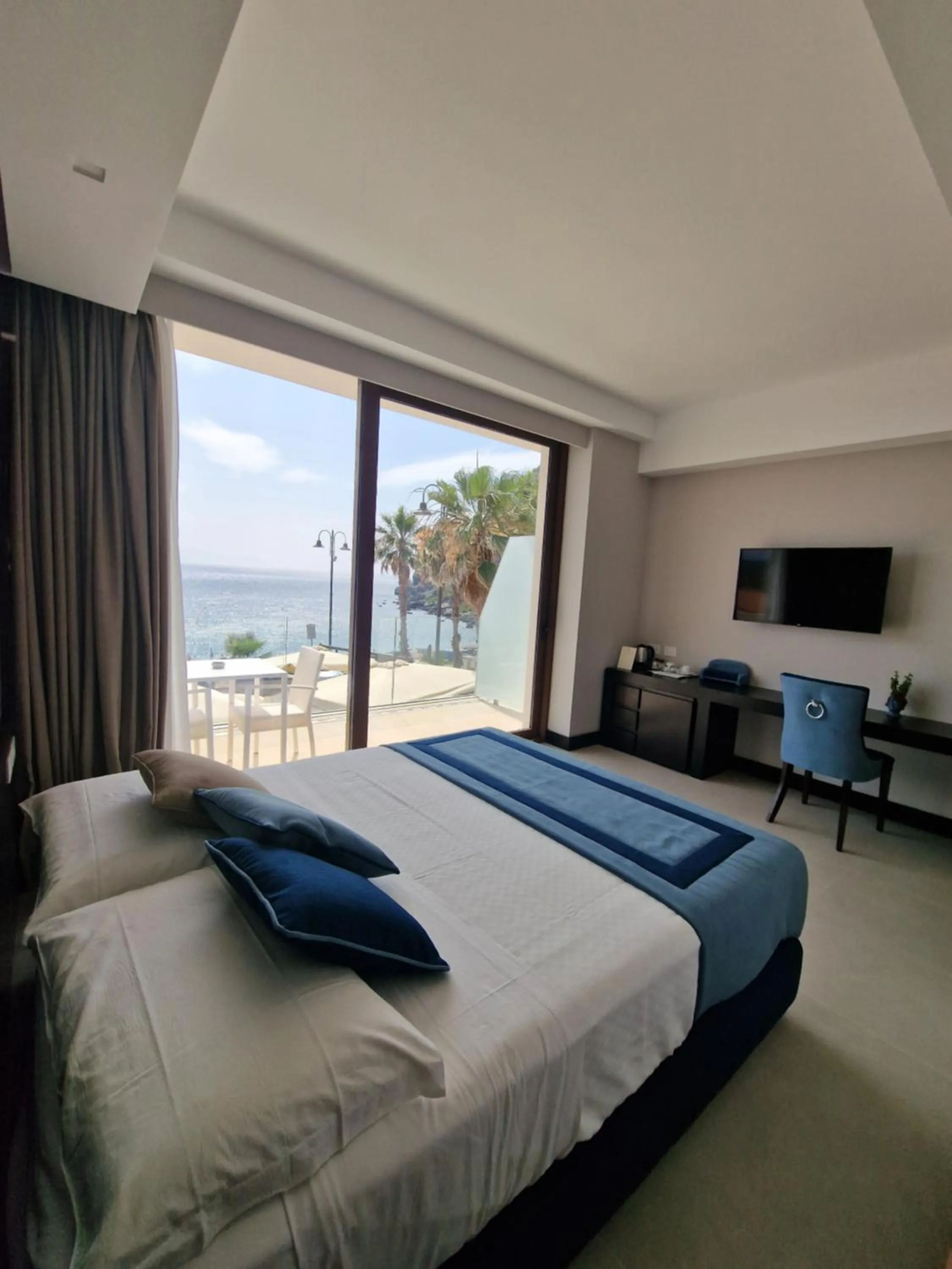 Bed in Ngonia Bay Boutique Hotel