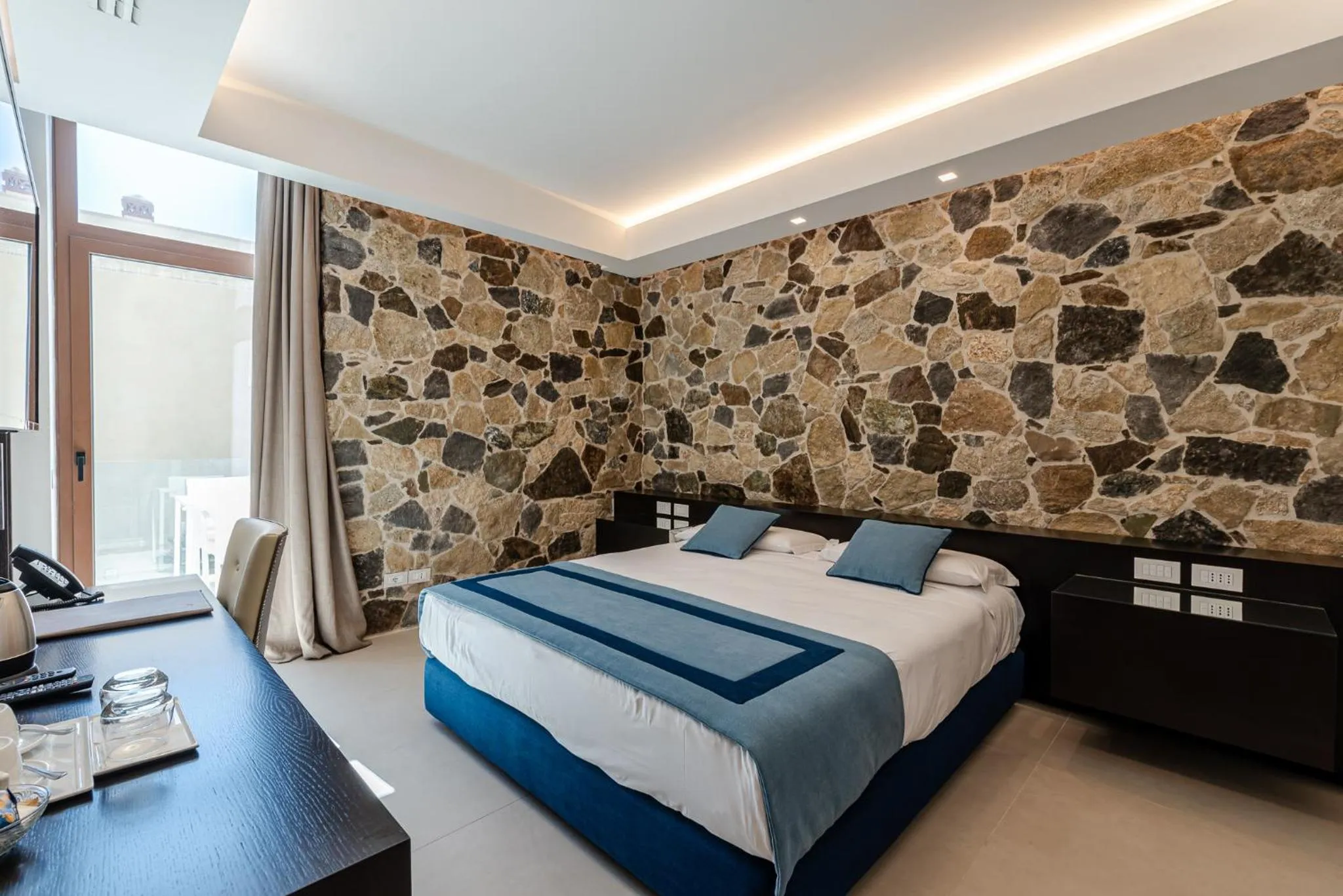 Bed in Ngonia Bay Boutique Hotel