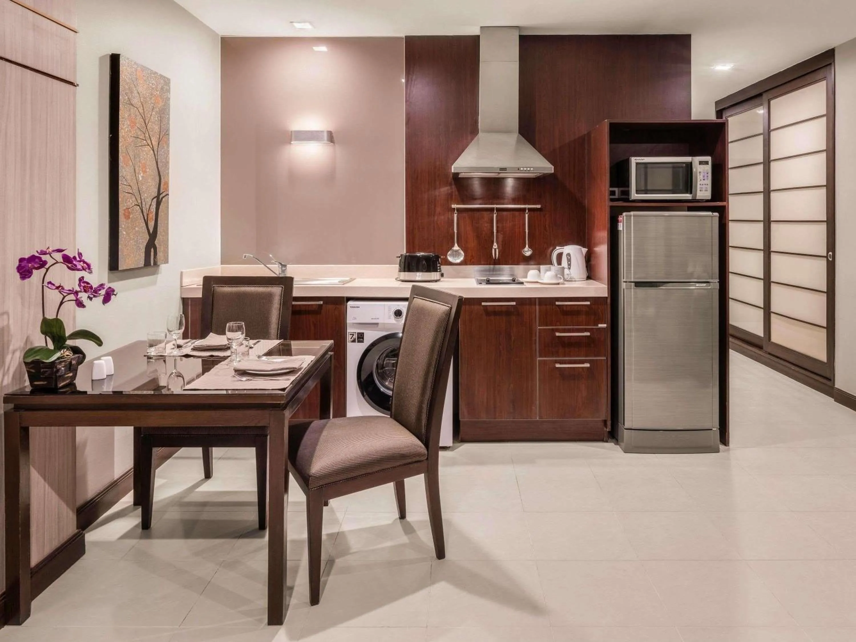 Bedroom in Grand Mercure Bangkok Asoke Residence