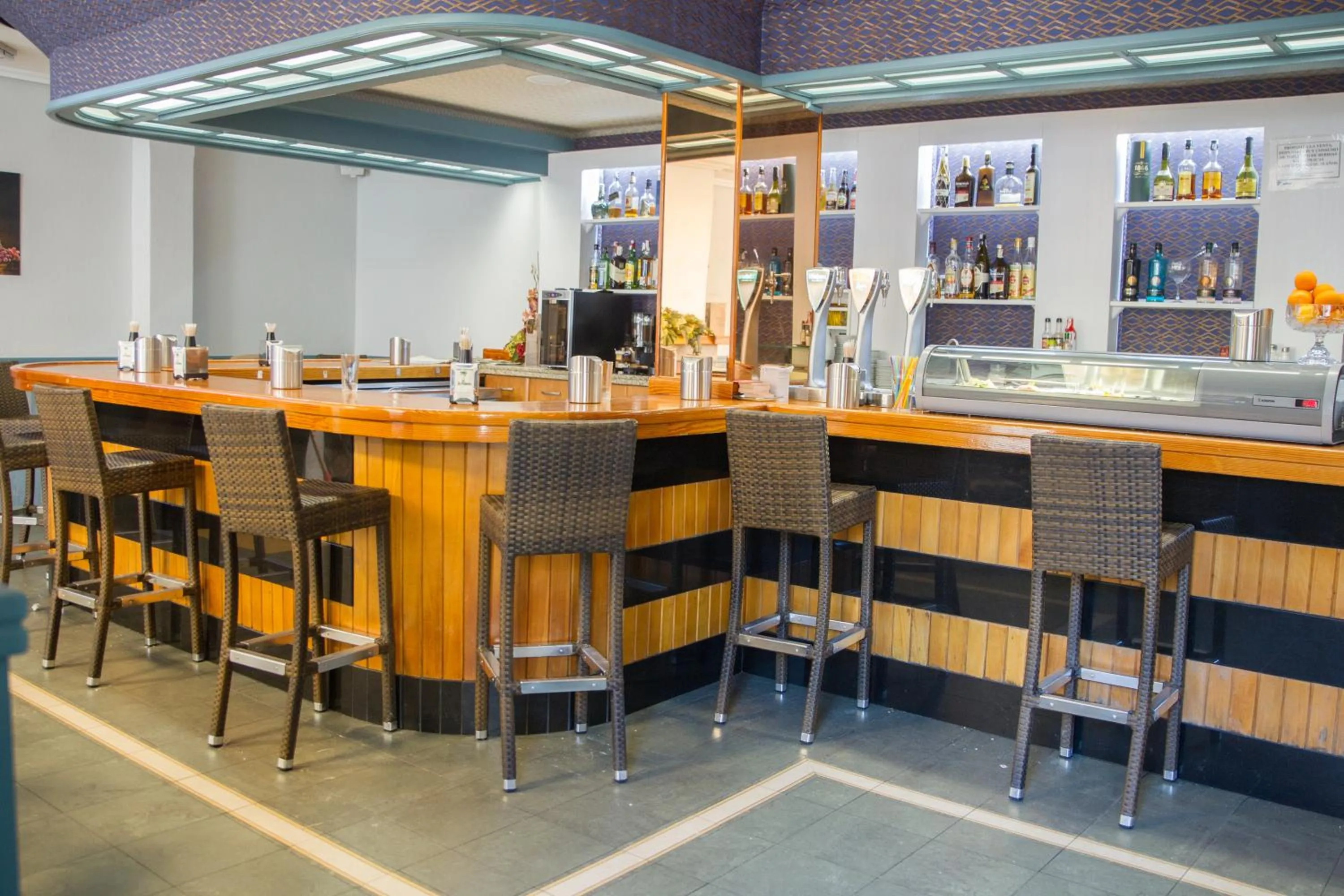 Lounge or bar in Hostal La Palmera