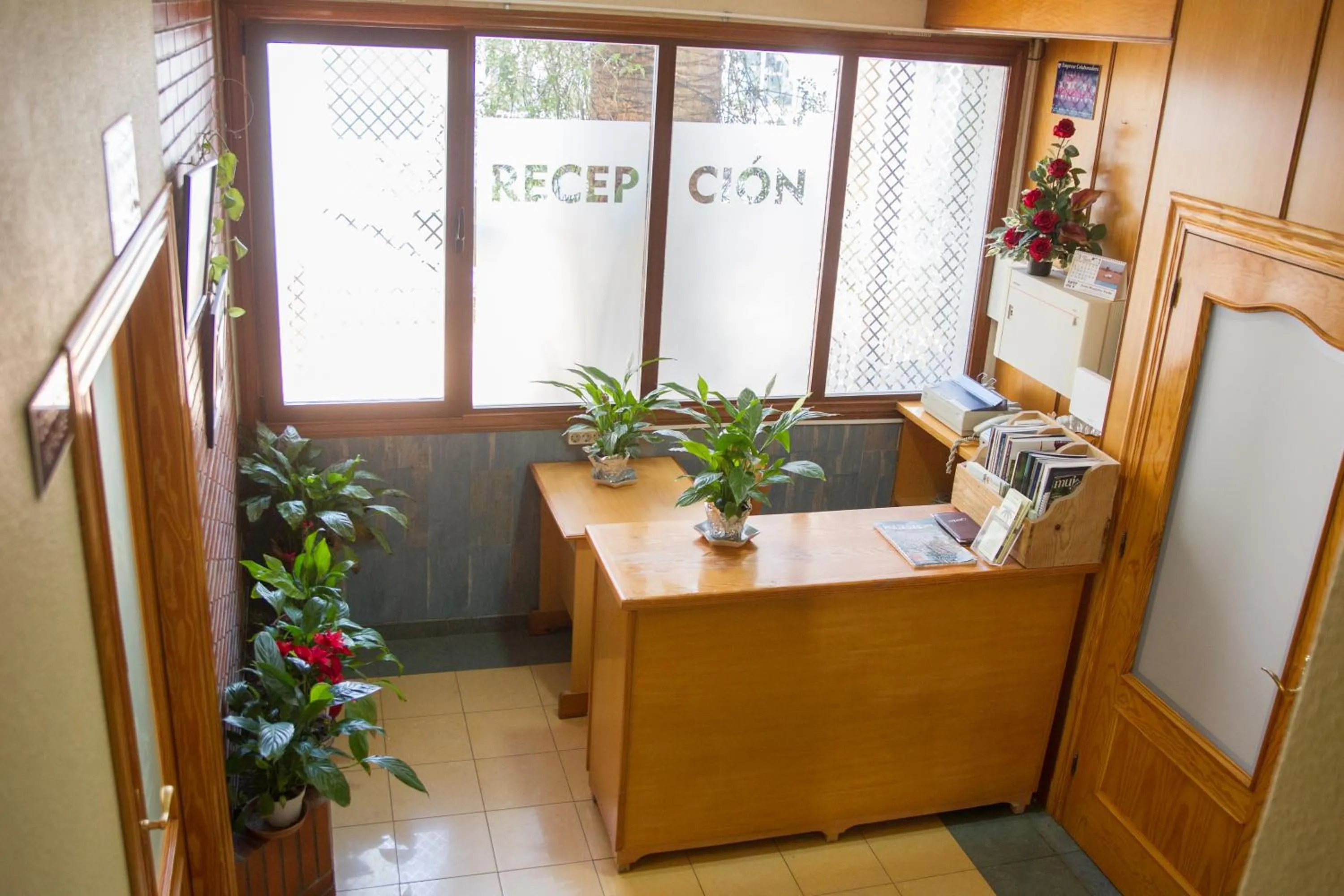 Lobby or reception in Hostal La Palmera