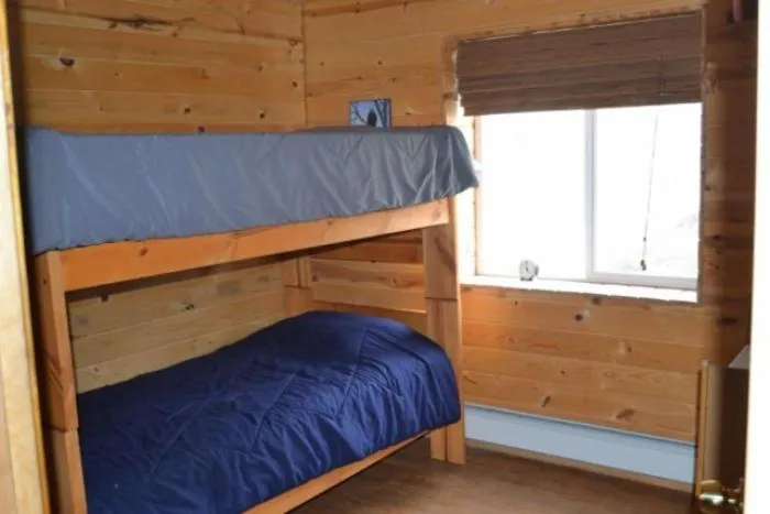 Bed in Alpine Creek Lodge