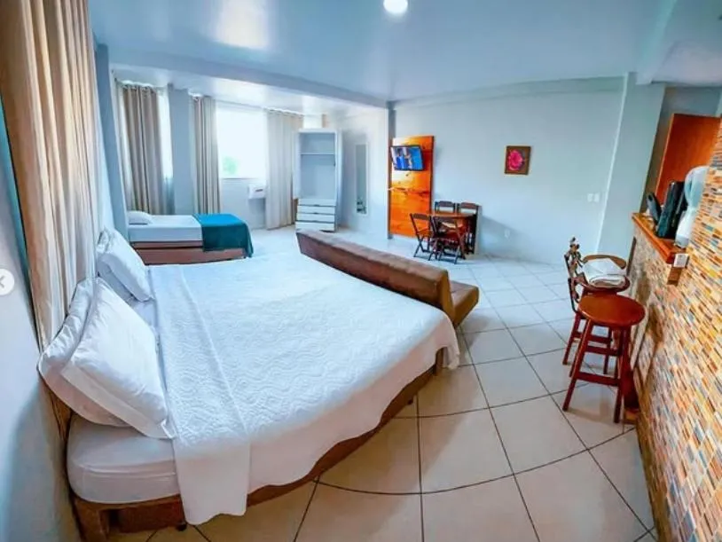 Bed in Pousada Loft Praia dos Anjos