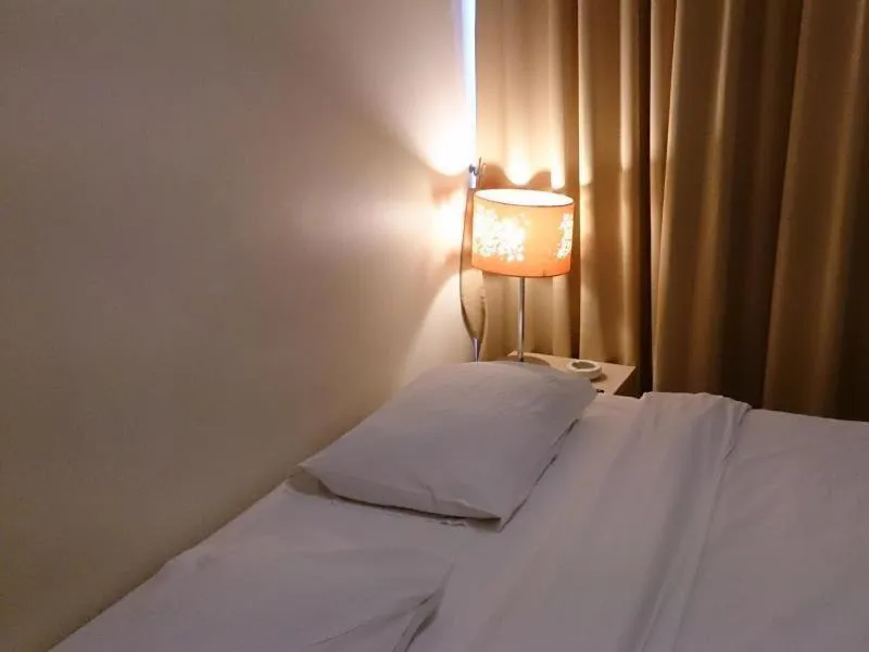 Bed in The Blooms Residence