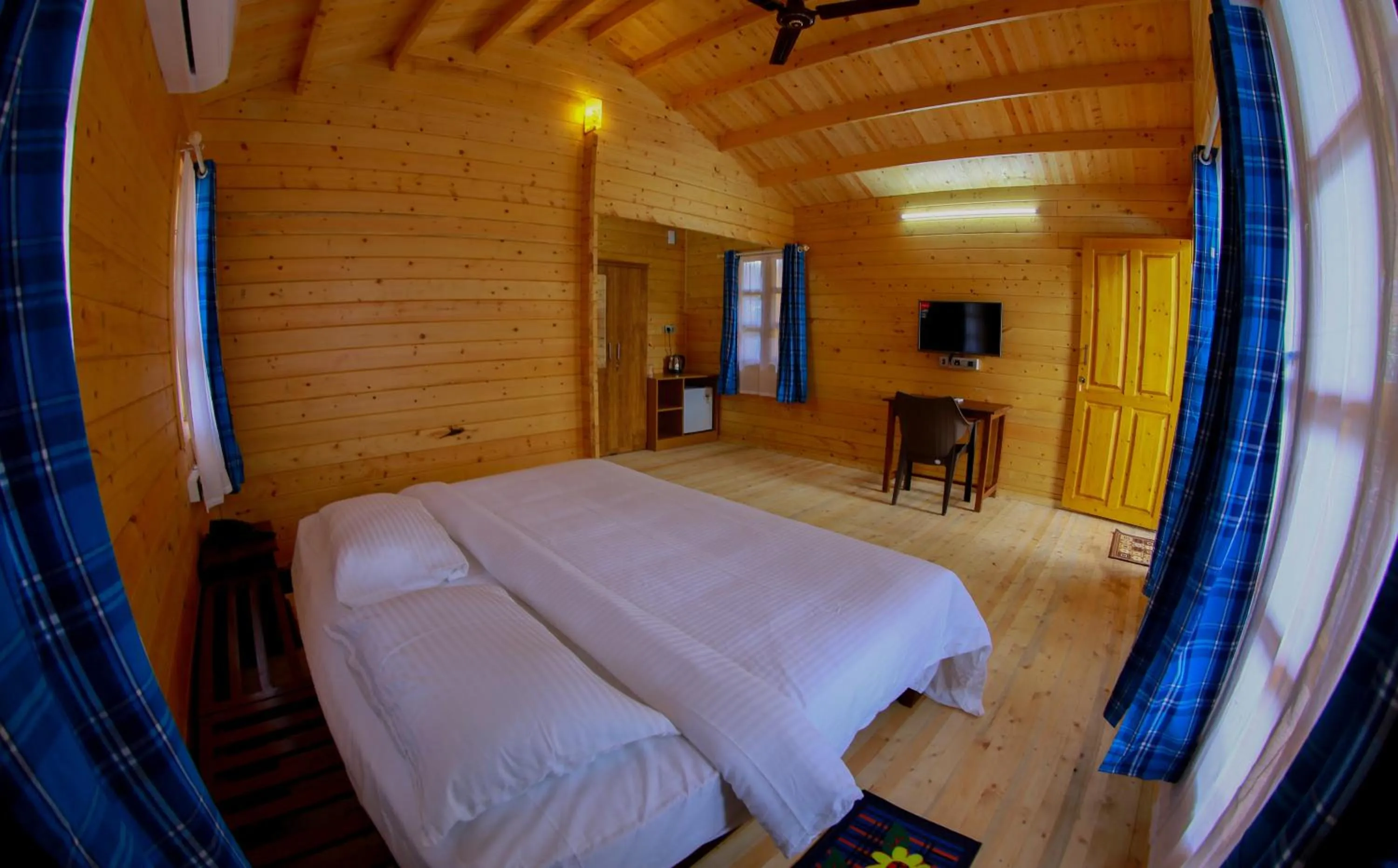 Bed in Woodgreens Heritage Resorts