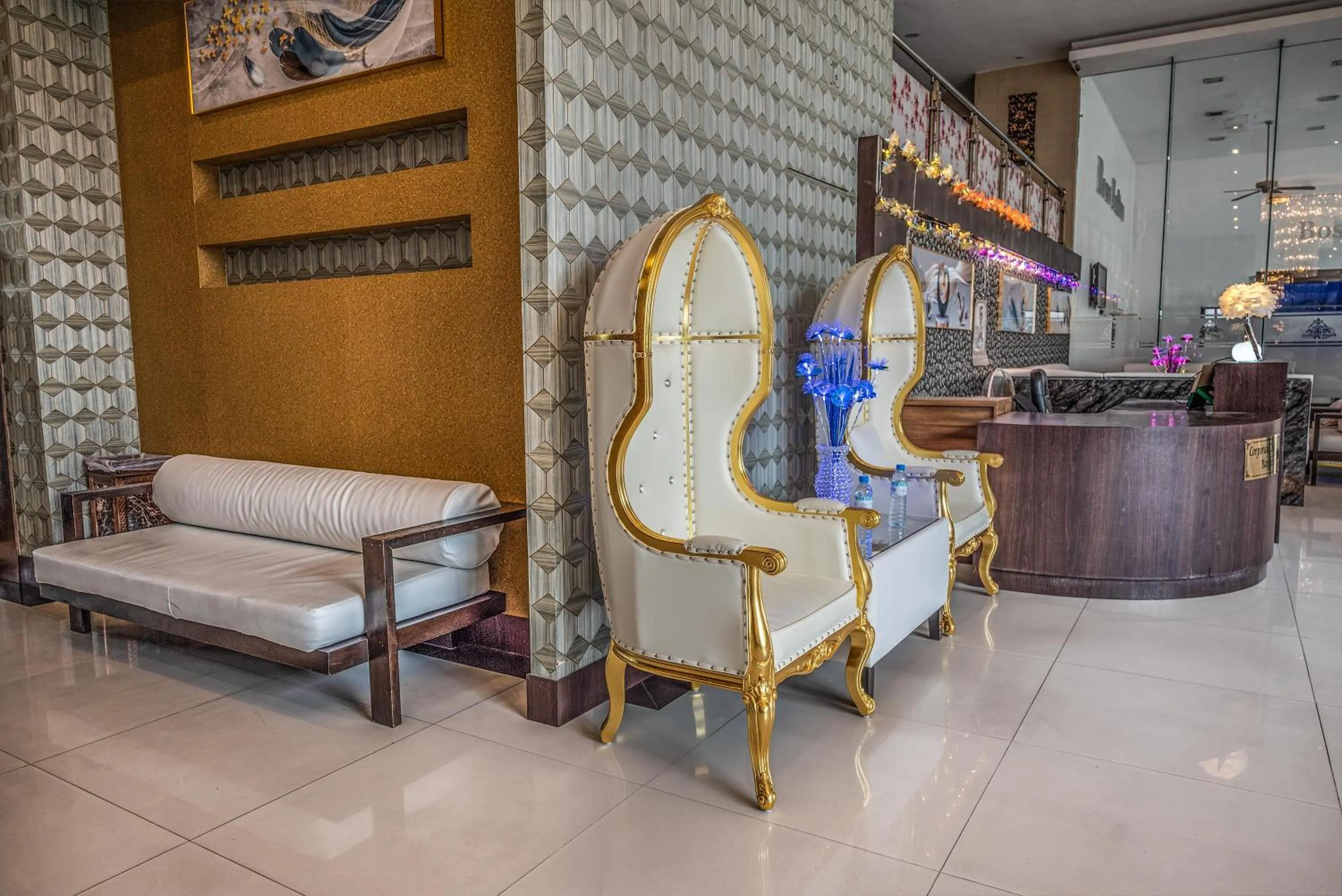 Seating area in Boss Suites Nana Hotel