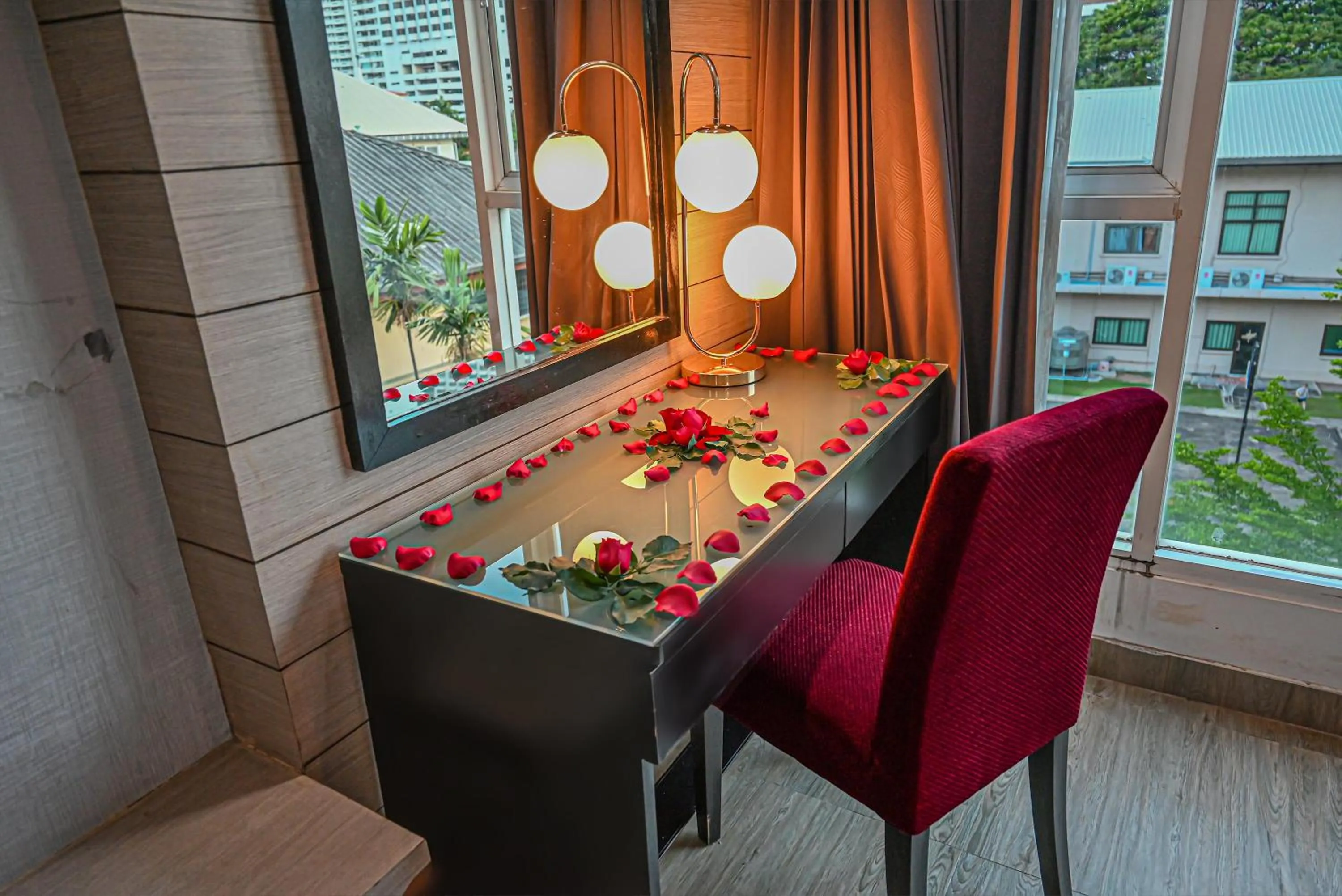 Seating area in Boss Suites Nana Hotel