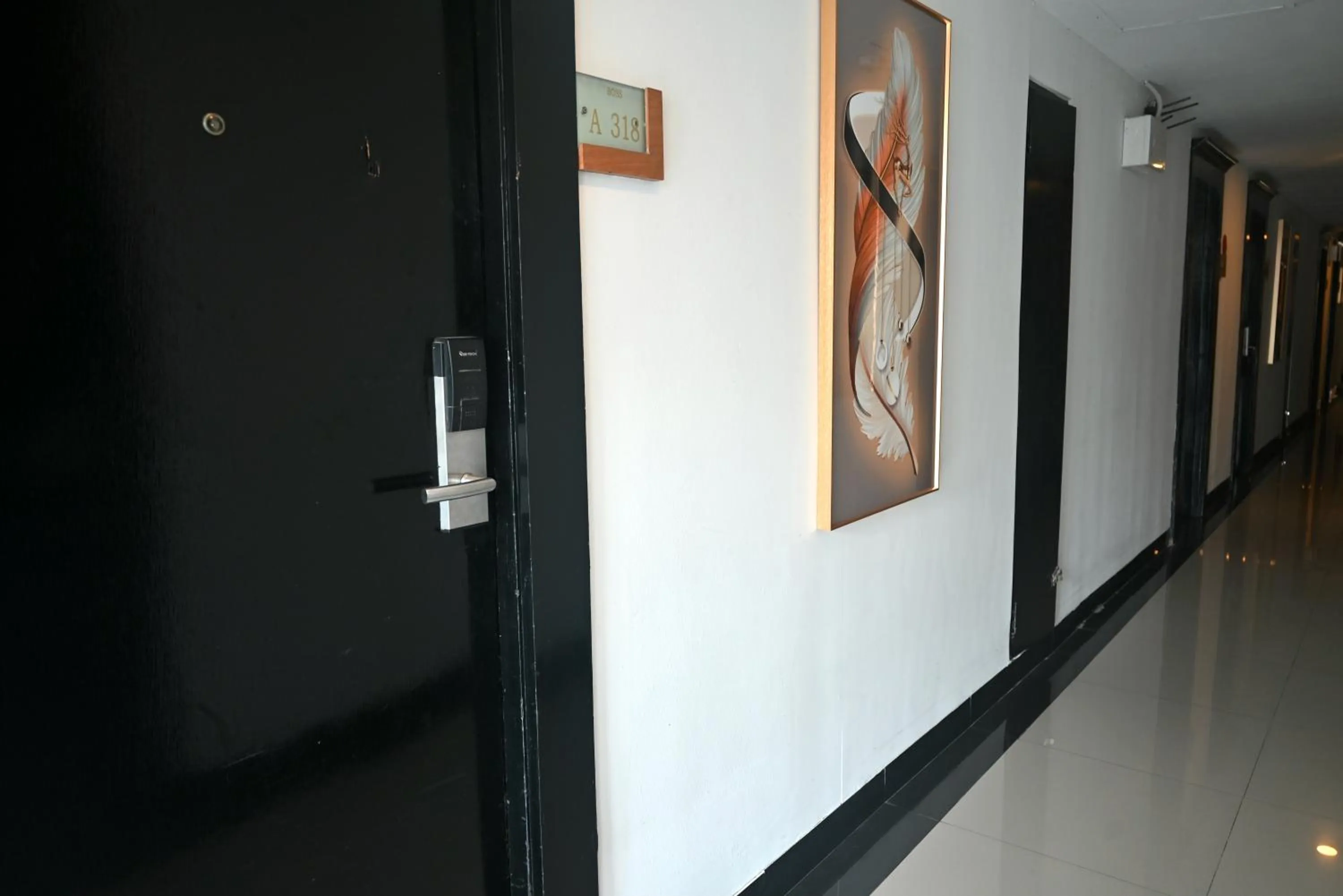 Property building in Boss Suites Nana Hotel