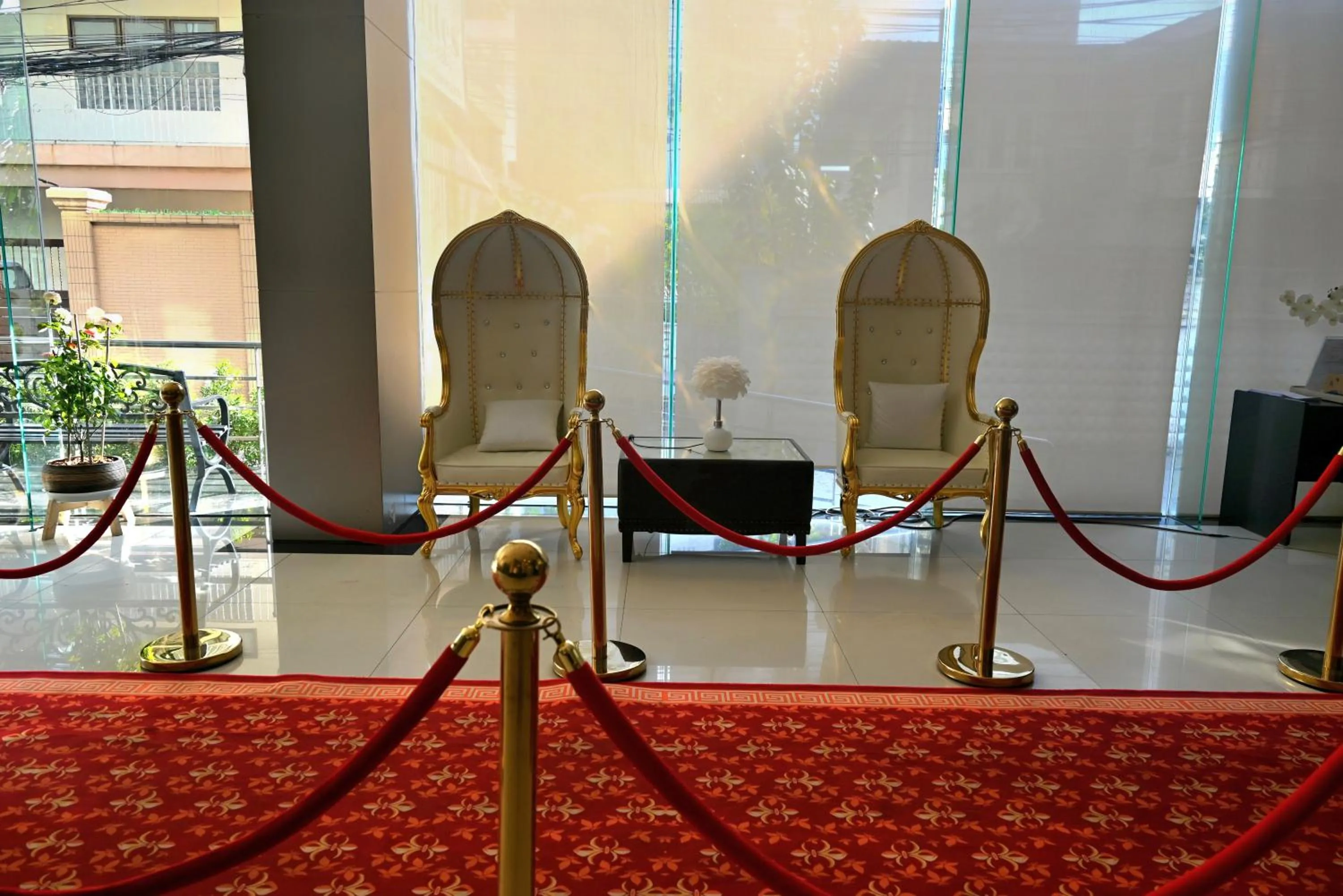 Lobby or reception in Boss Suites Nana Hotel