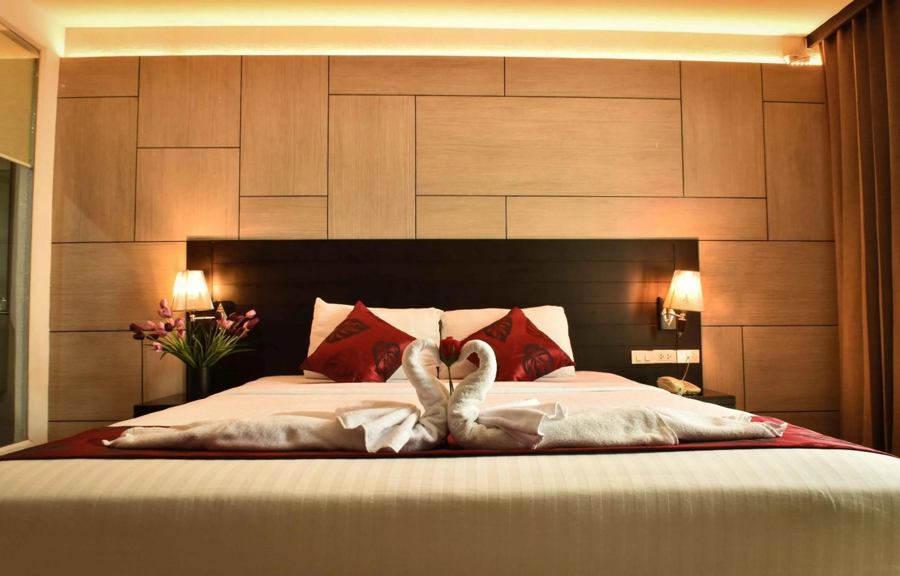 Bedroom, Bed in Boss Suites Nana Hotel