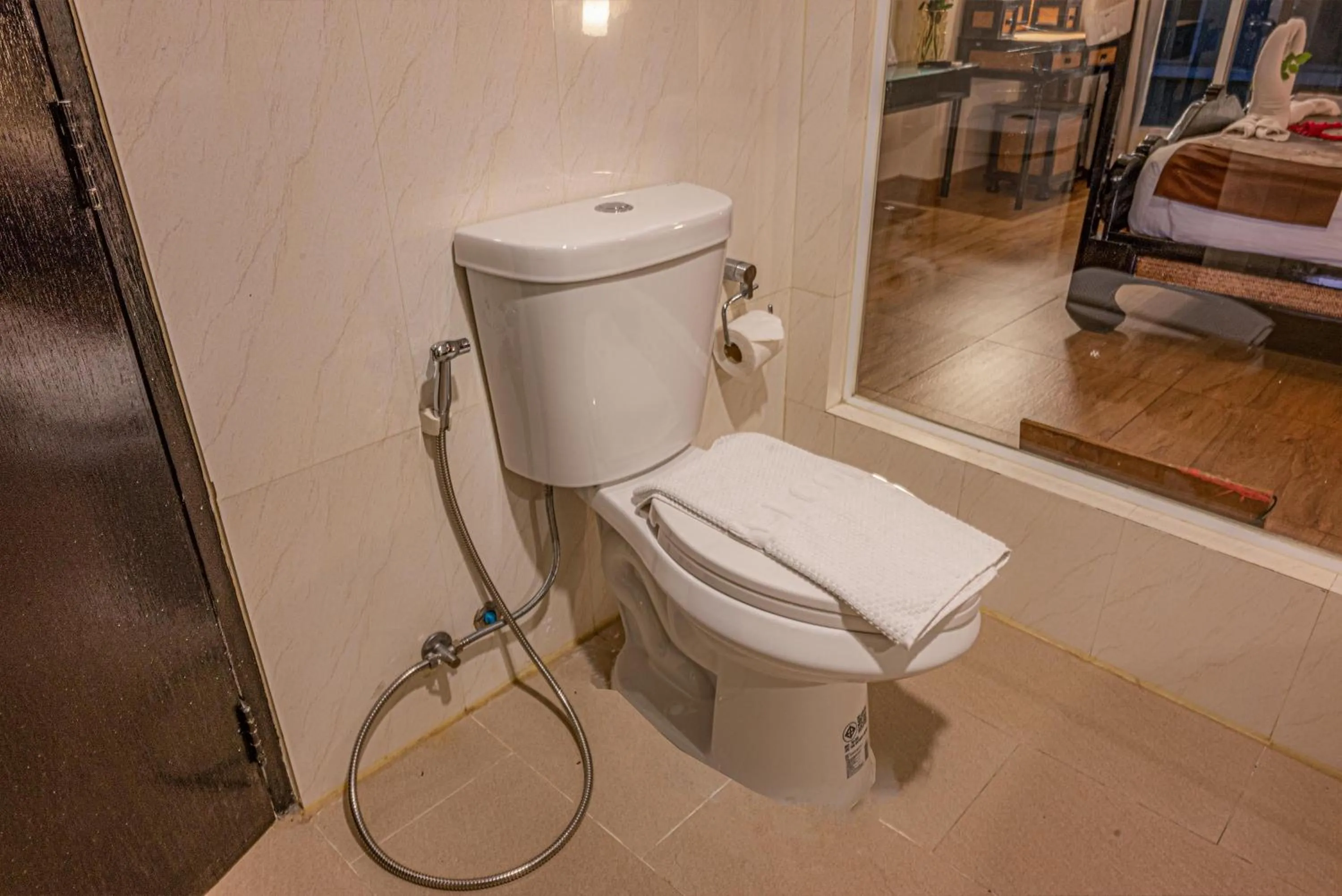 Toilet in Boss Suites Nana Hotel