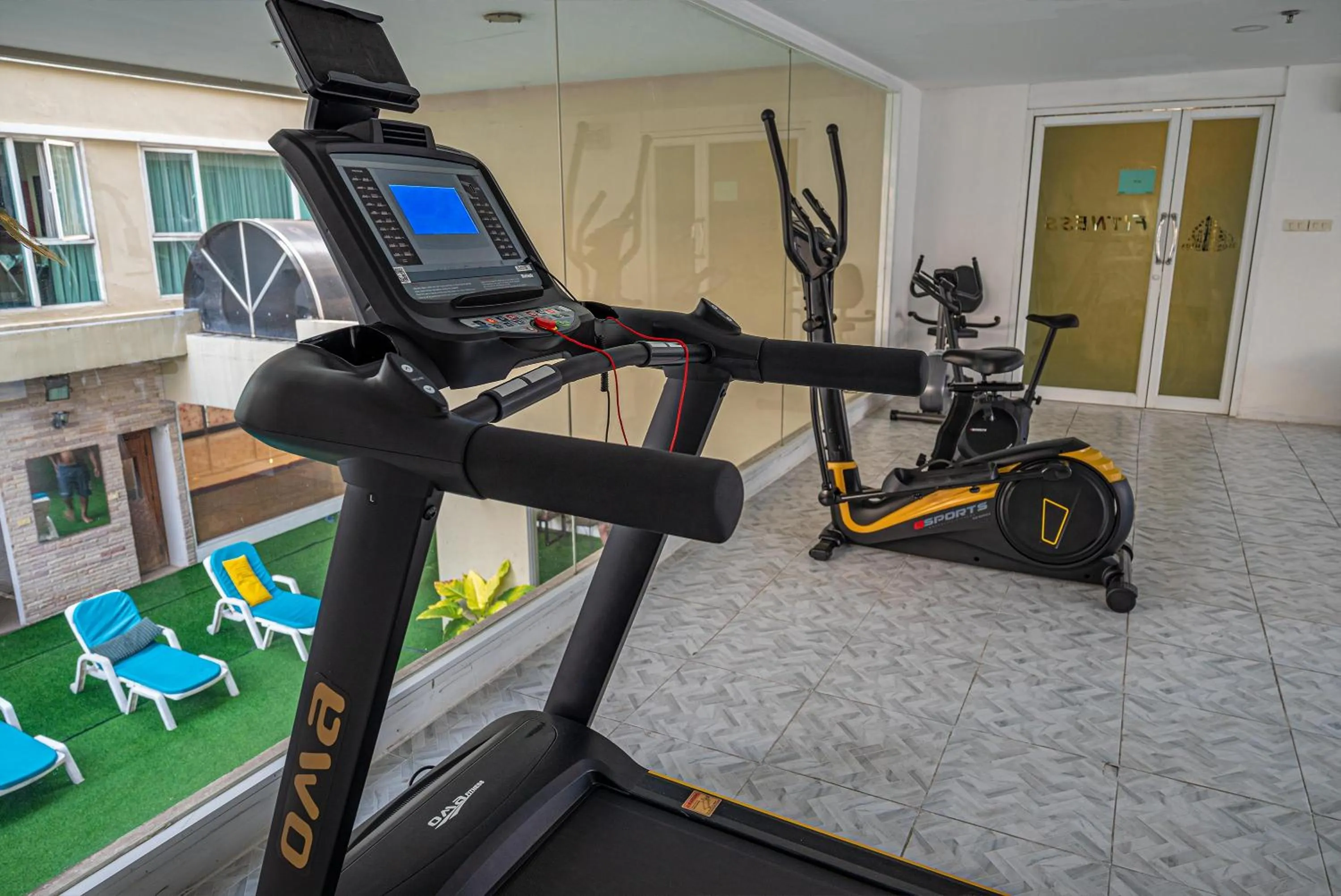 Fitness centre/facilities in Boss Suites Nana Hotel