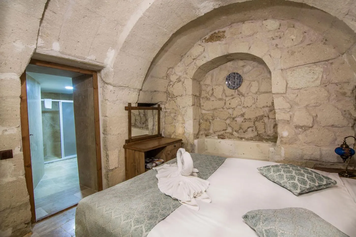 Bed in Cappadocia Ozbek Stone House