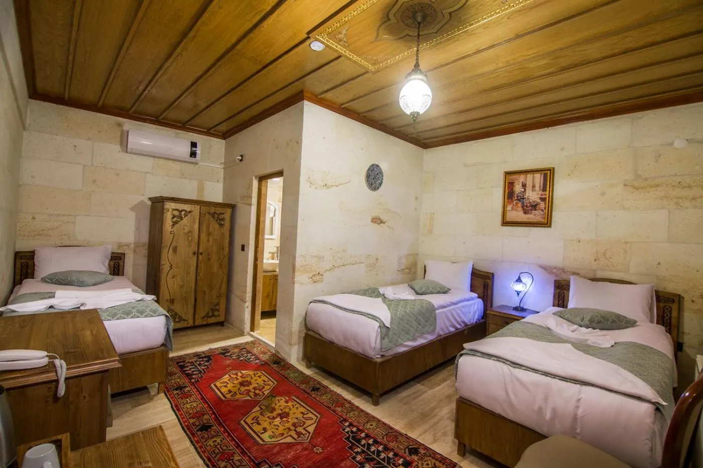 Bed in Cappadocia Ozbek Stone House