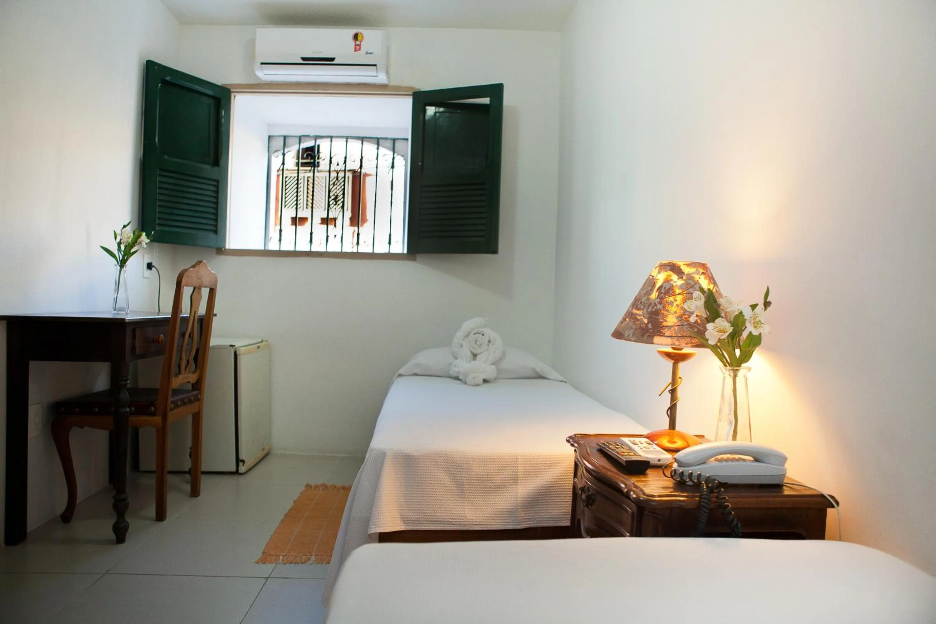 Bed in Pousada dos Quatro Cantos