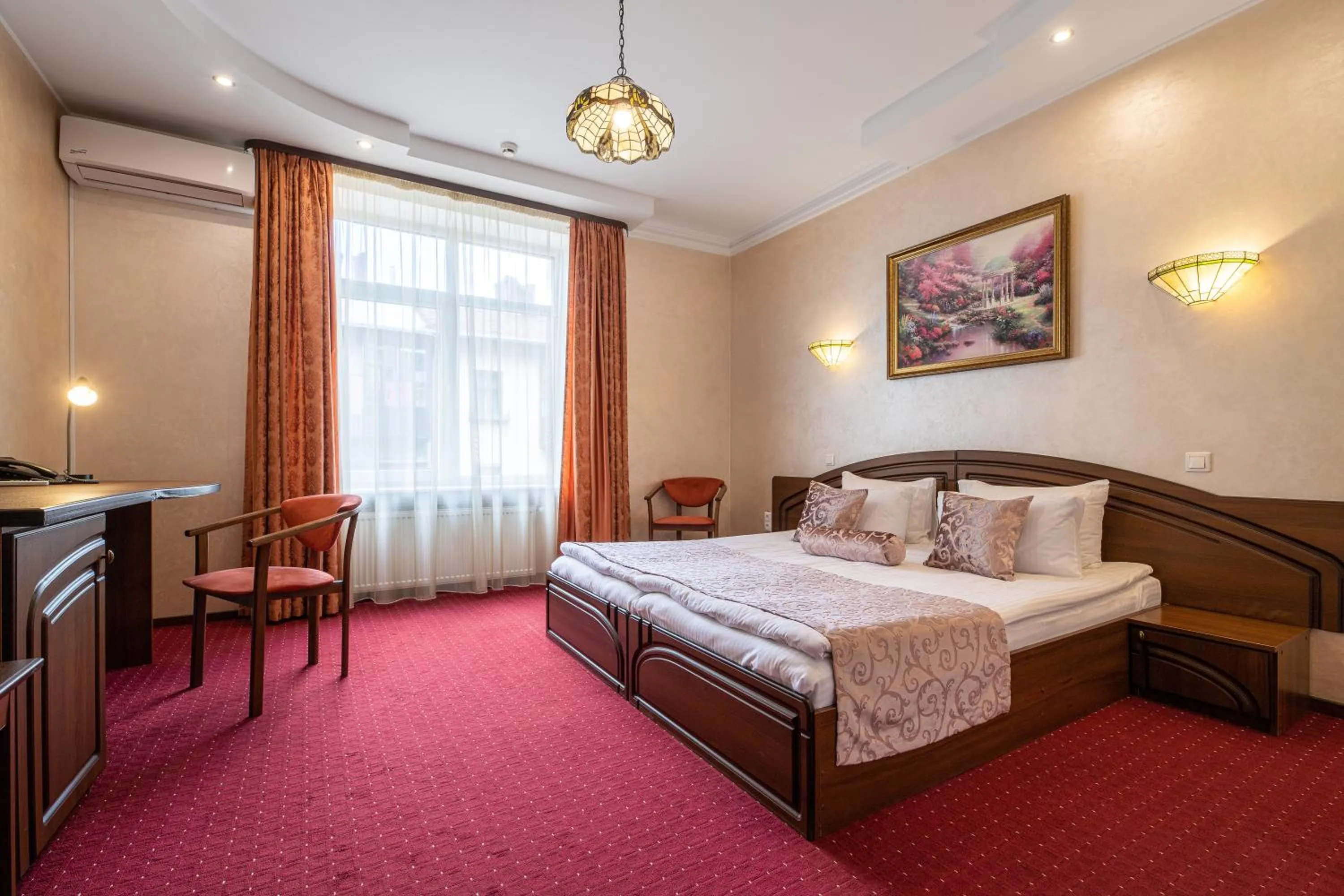 Photo of the whole room, Bed in Edem Hotel Lviv