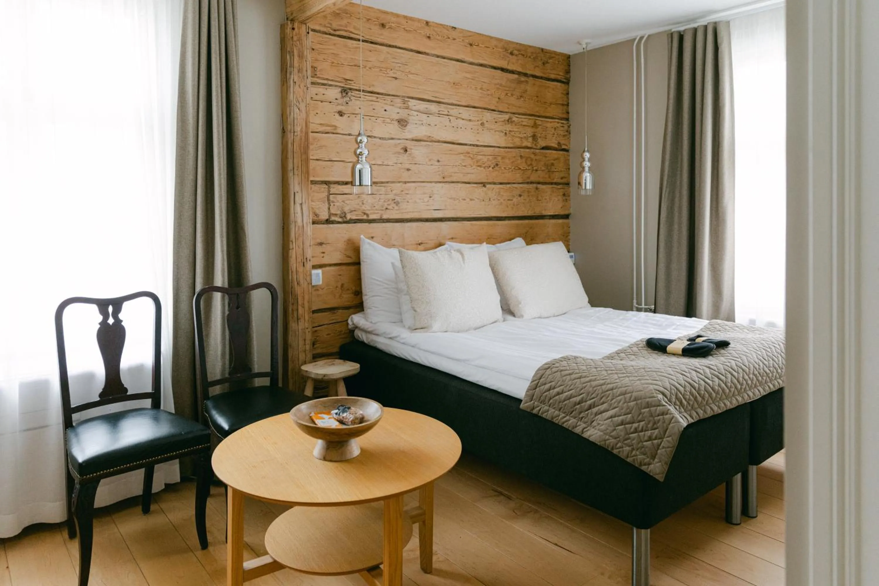 Bed in Lillan Hotel & Kök